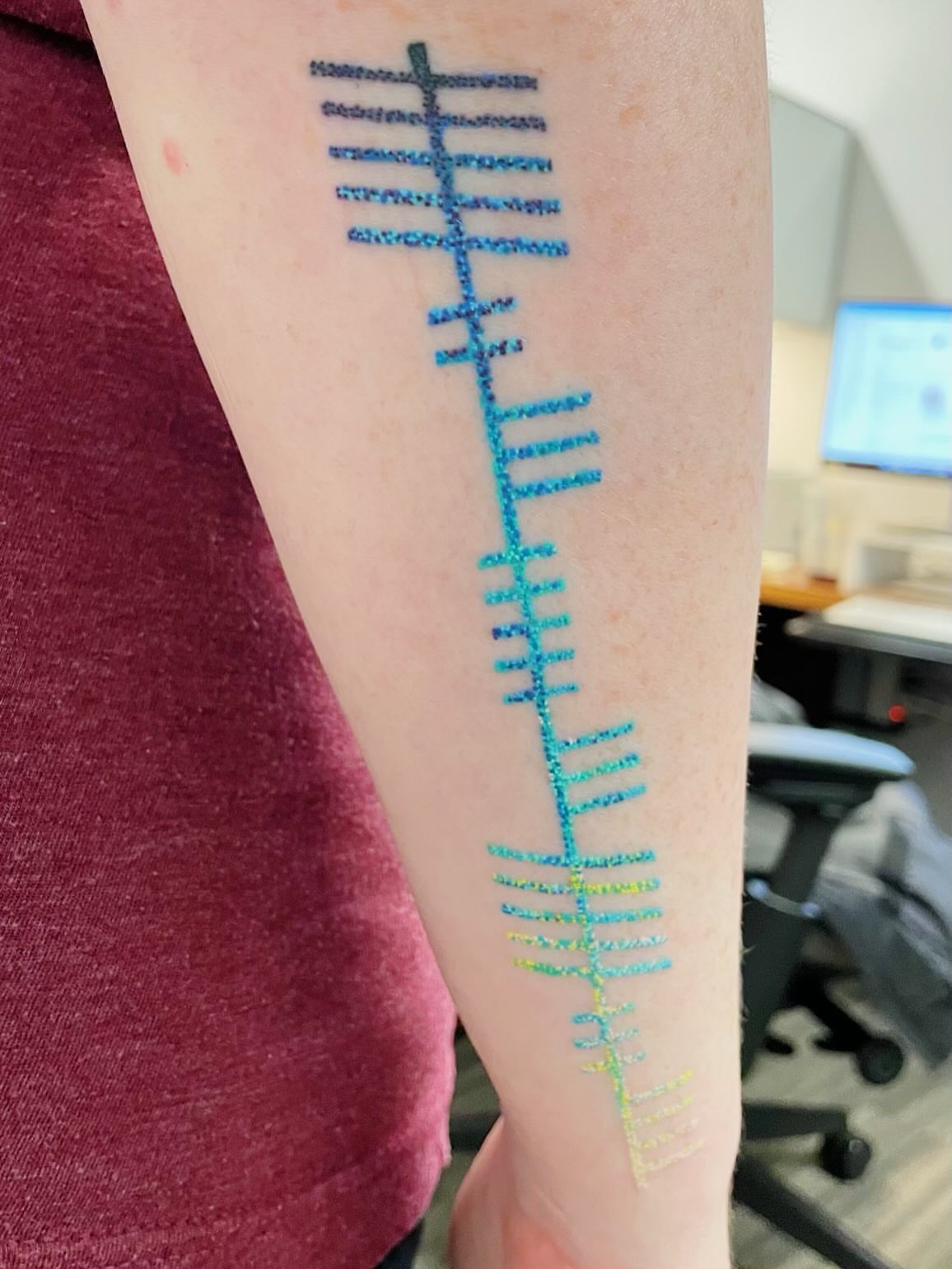 Vertical line pattern fine line tattoo on the forearm by LiteBriteTattoo, Salt Lake City, Utah