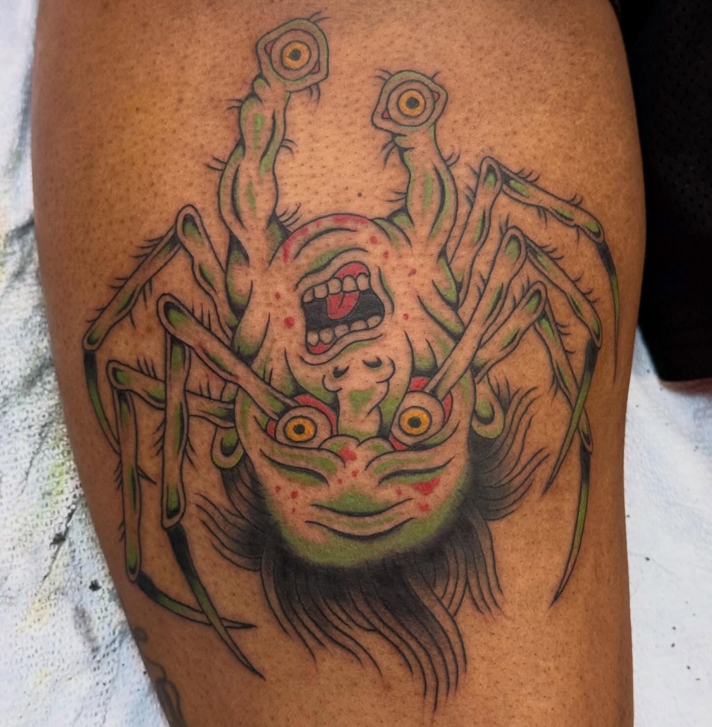Spider American traditional tattoo on the thigh by Emma Eaton