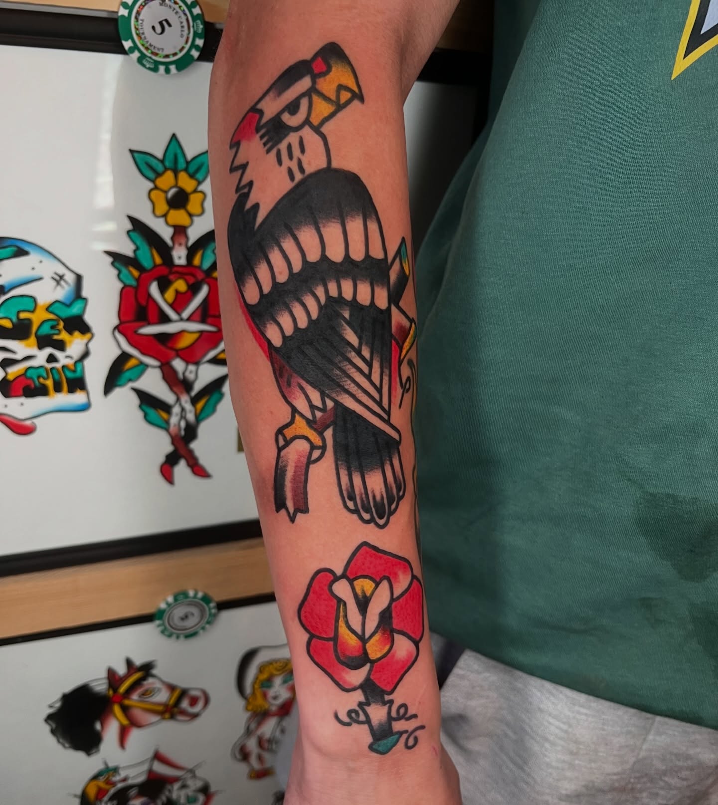 Bird and rose American traditional tattoo on the forearm by Like A Horse Corral