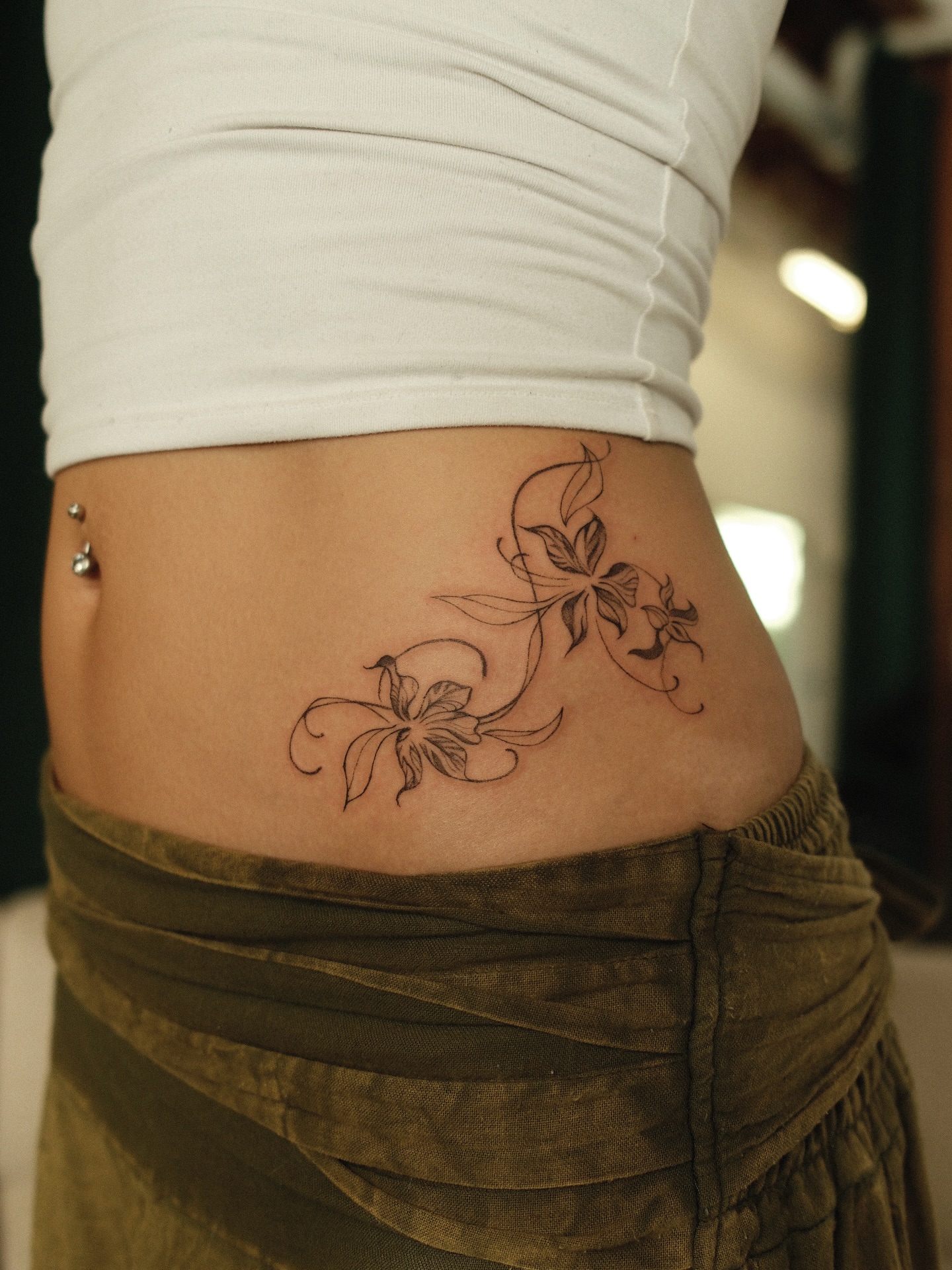 Floral design black and grey tattoo on the torso by v?