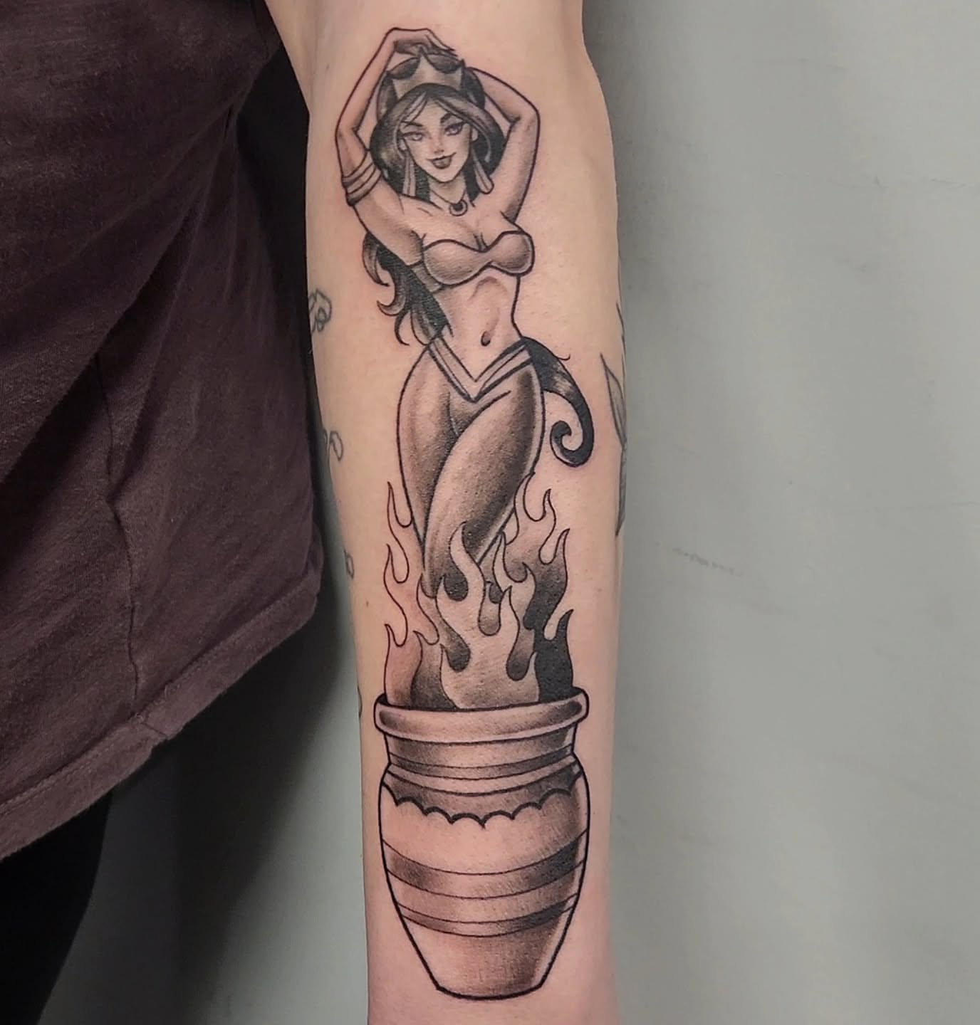 Mermaid black and grey tattoo on the forearm by Jason August