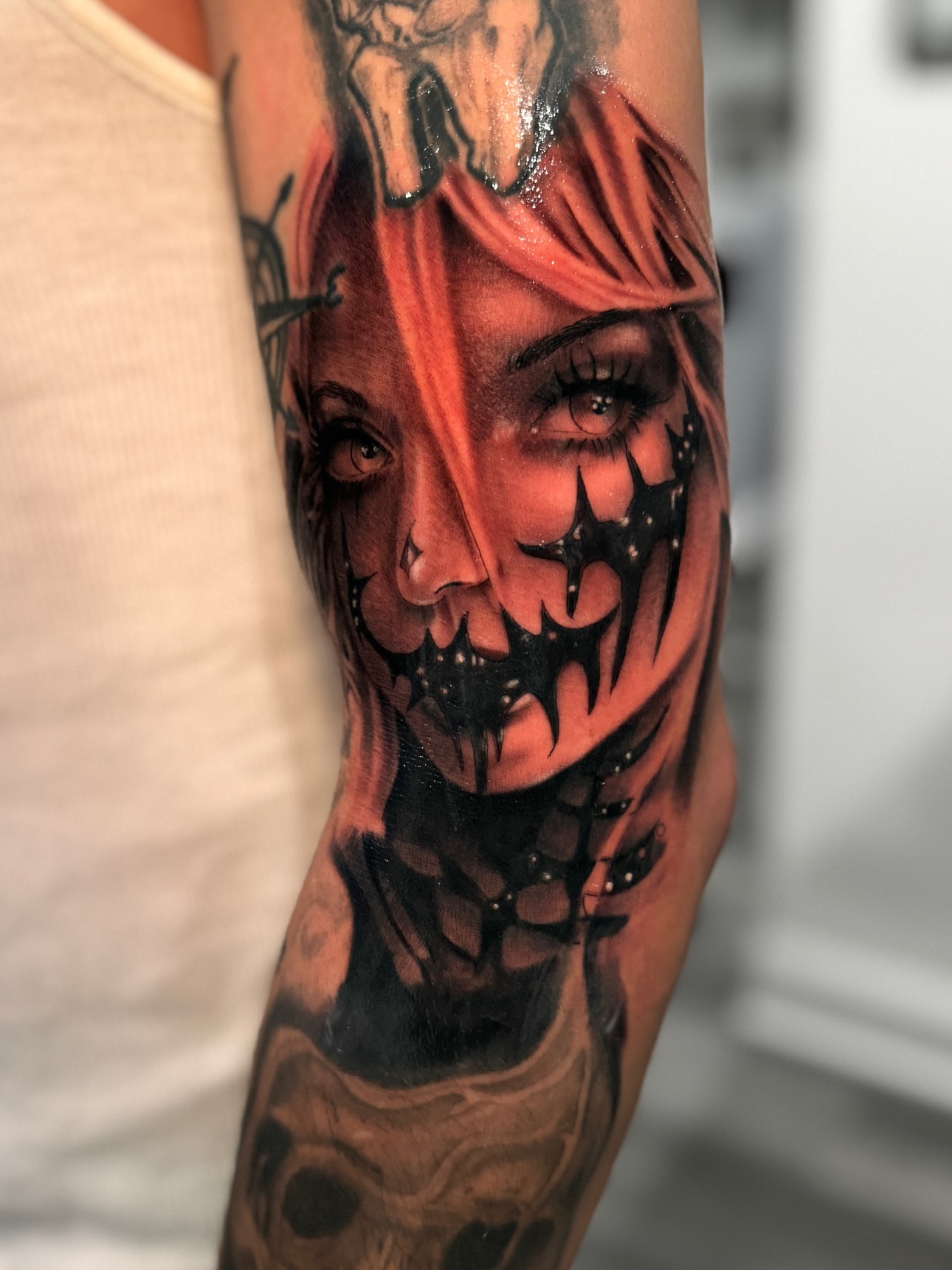 Woman with mask dark realism tattoo on the forearm by Miguel Garcia