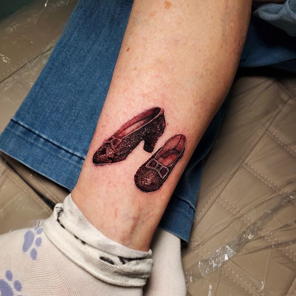 Ruby slippers realism tattoo on the forearm by Matthew Ray, Harrisburg, North Carolina