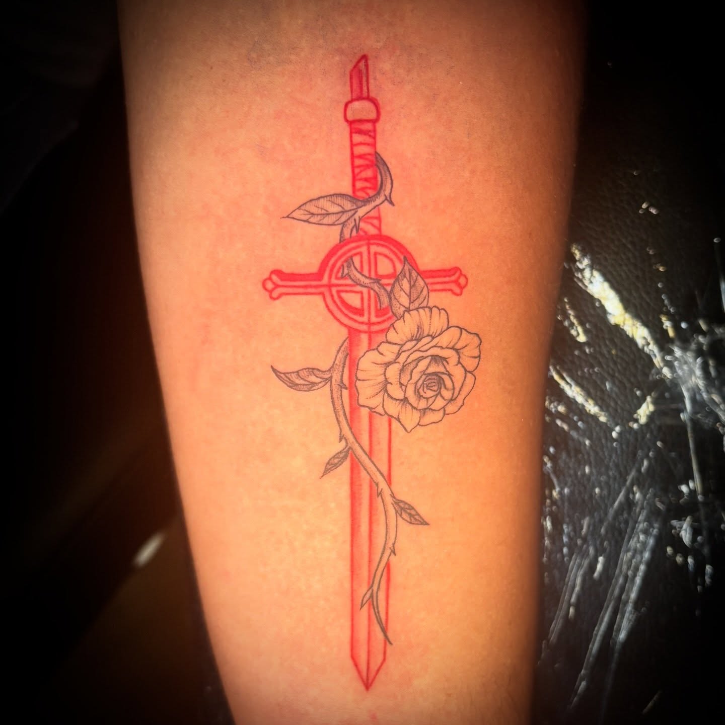 Sword and rose neo-traditional tattoo on the forearm by Kiwi🌱☀️