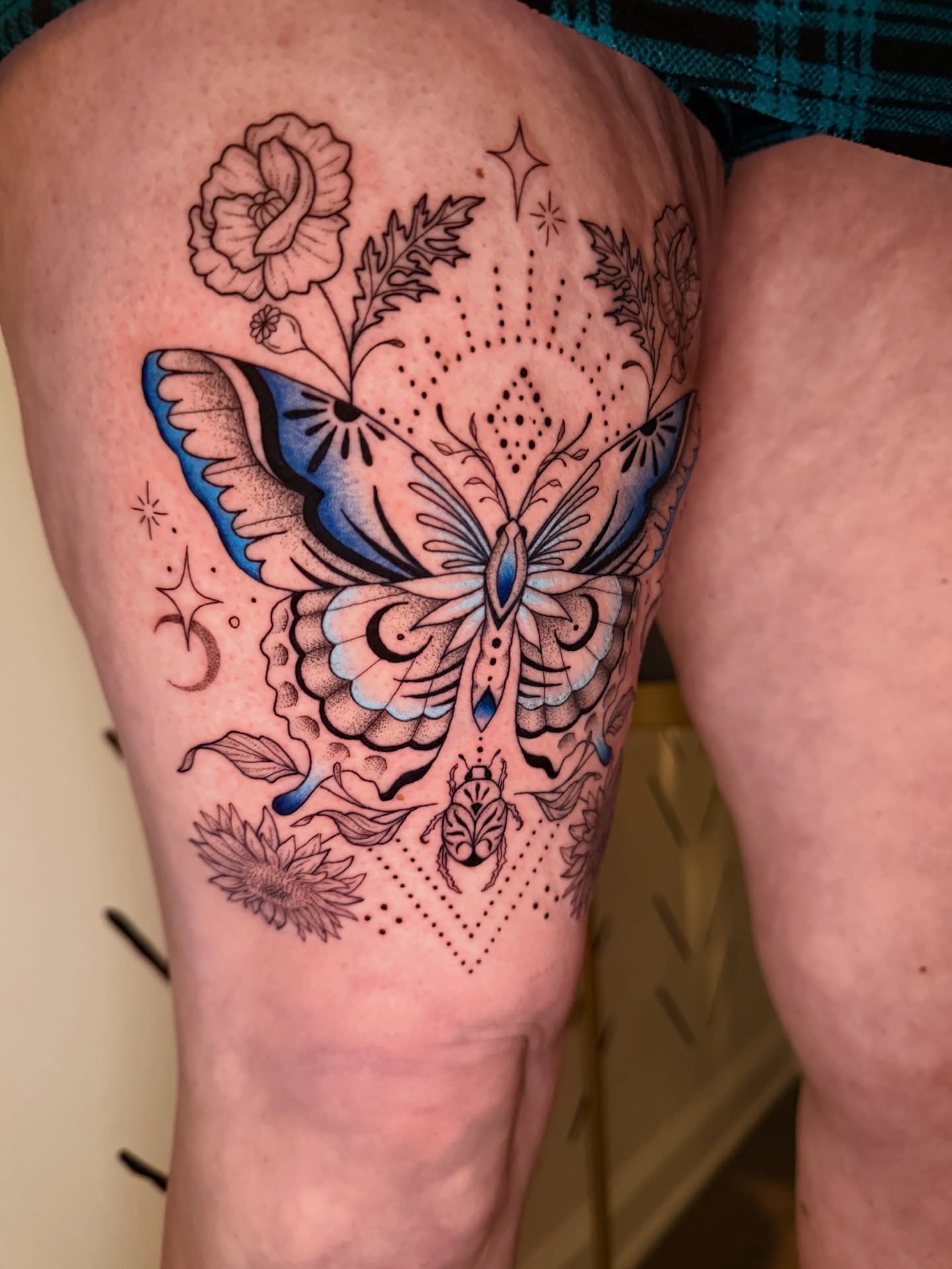 Butterfly and floral dotwork tattoo on the thigh by ππ£ππ€π₯π ππ¦ππ‘π, Lakewood, Colorado