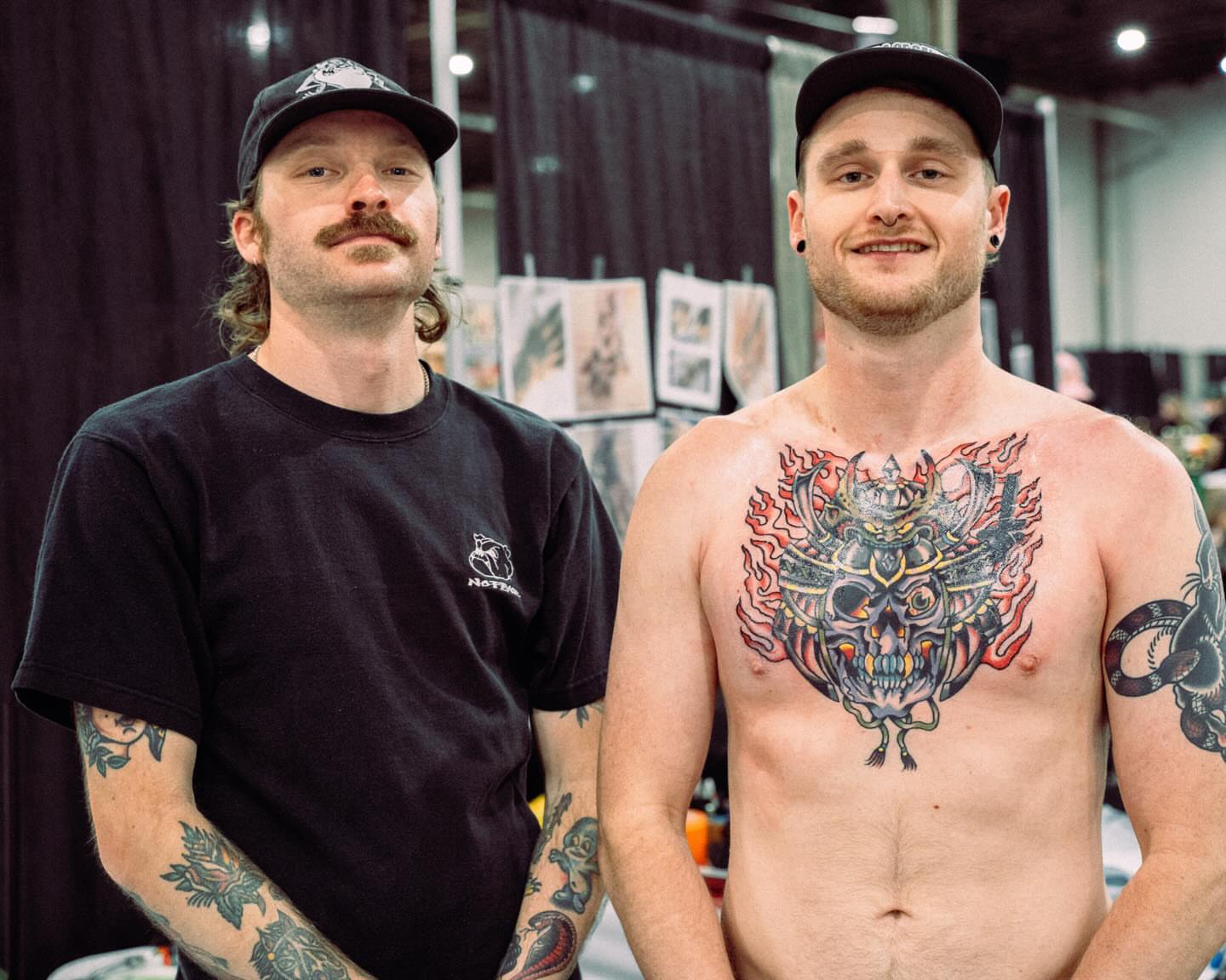 Skull with flames japanese irezumi tattoo on the chest by Ty Elias