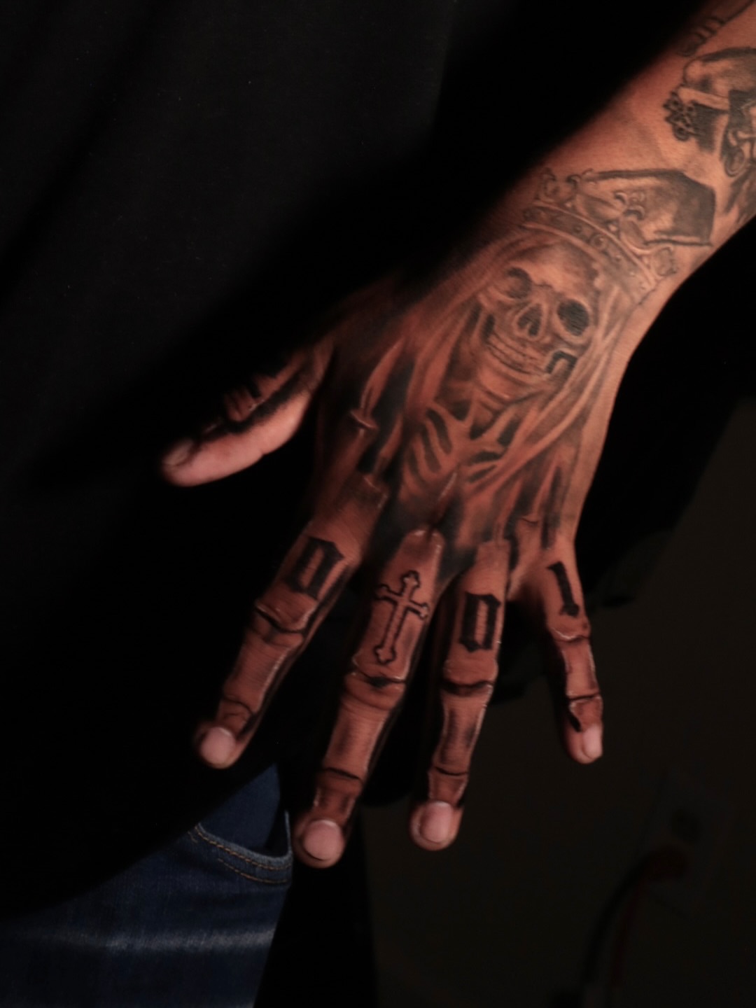 Skull and crossbones dark realism tattoo on the hand by Mr Letters🗡️