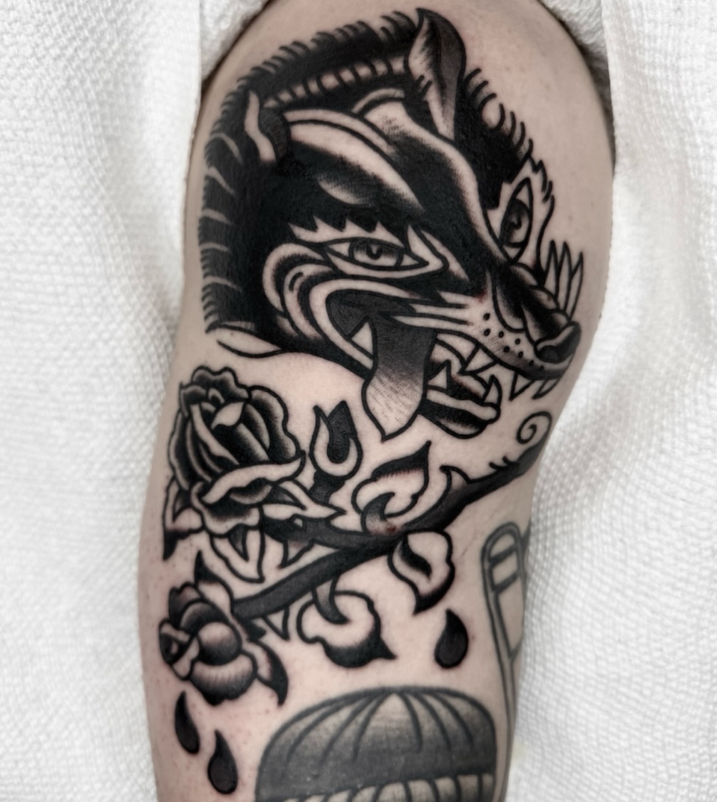 Dragon and roses American traditional tattoo on the forearm by لا Kenny McCabe لا