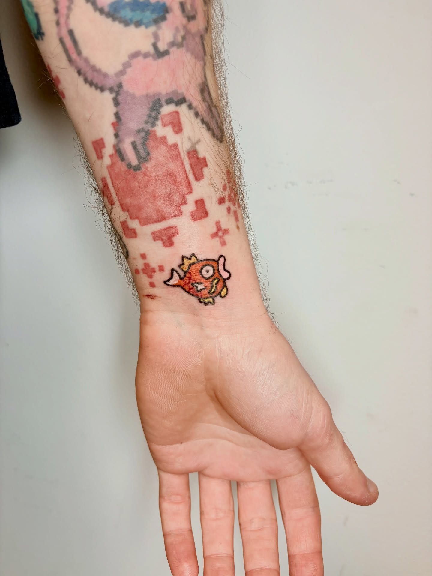 Fish dotwork tattoo on the forearm by Rami, Maden🇰🇷