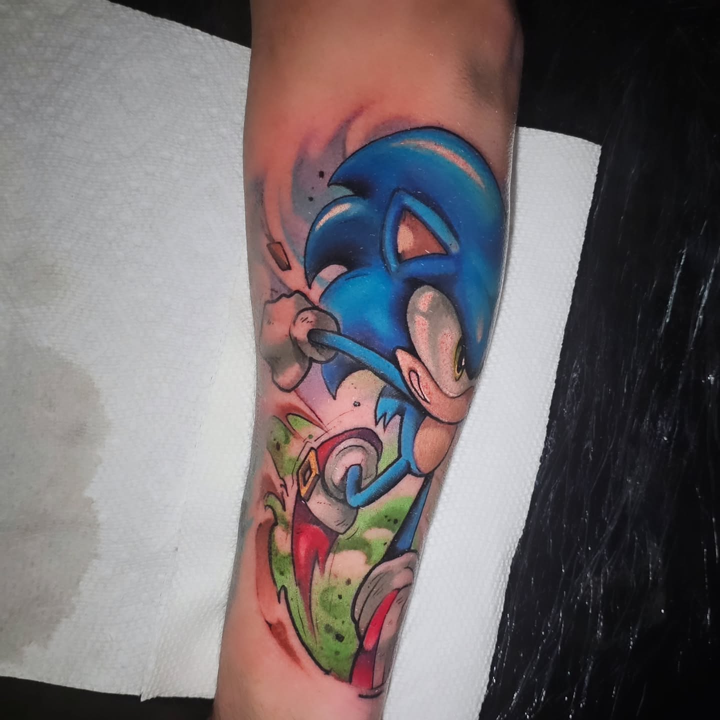 Sonic the Hedgehog new school tattoo on the forearm by Cody Gower Tattoo Artist