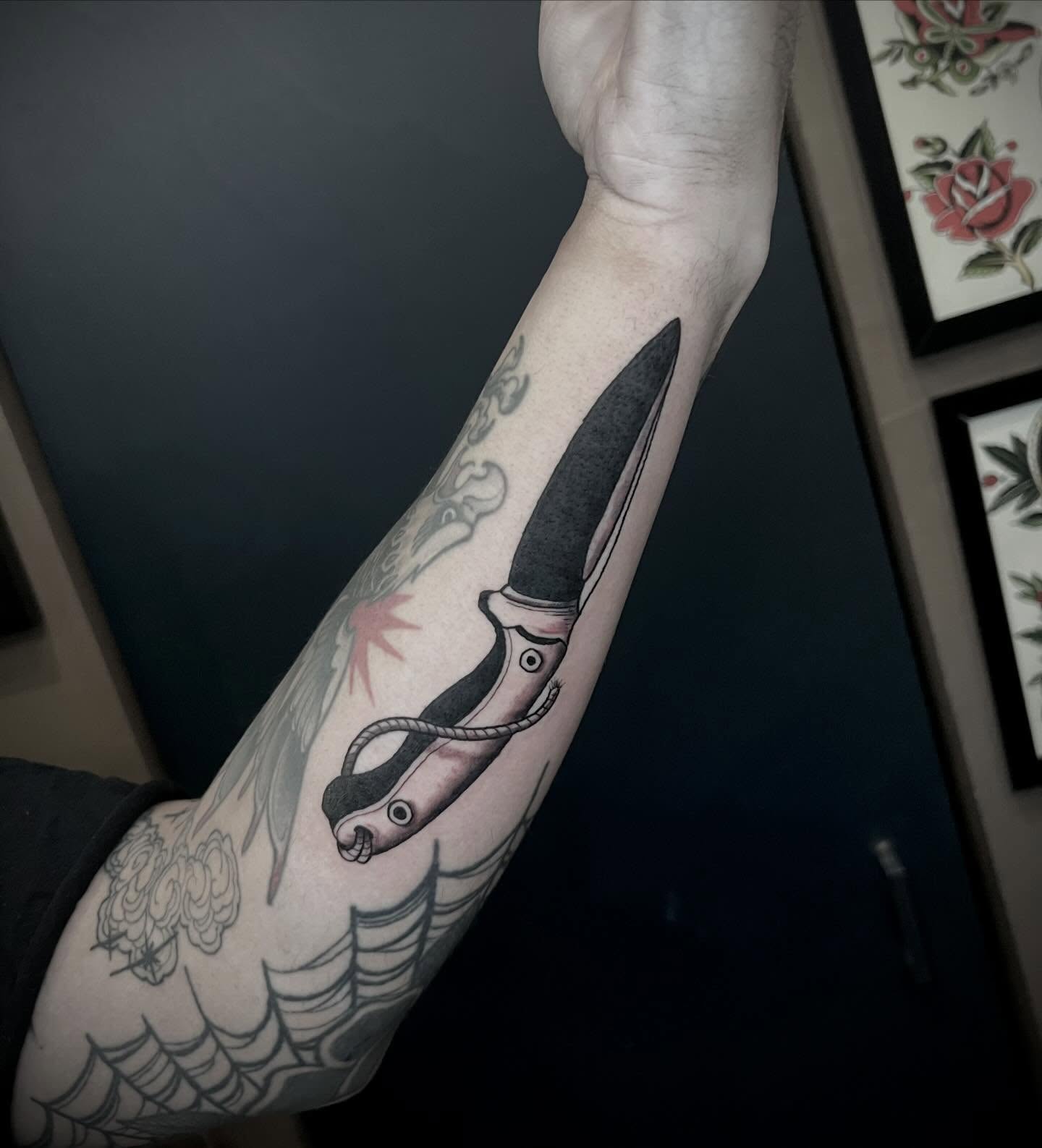 Snake and knife American traditional tattoo on the forearm by Eoghann McGregor
