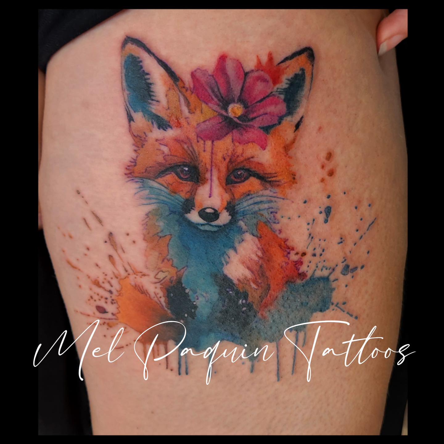 Fox watercolor tattoo on the thigh by Mel Paquin