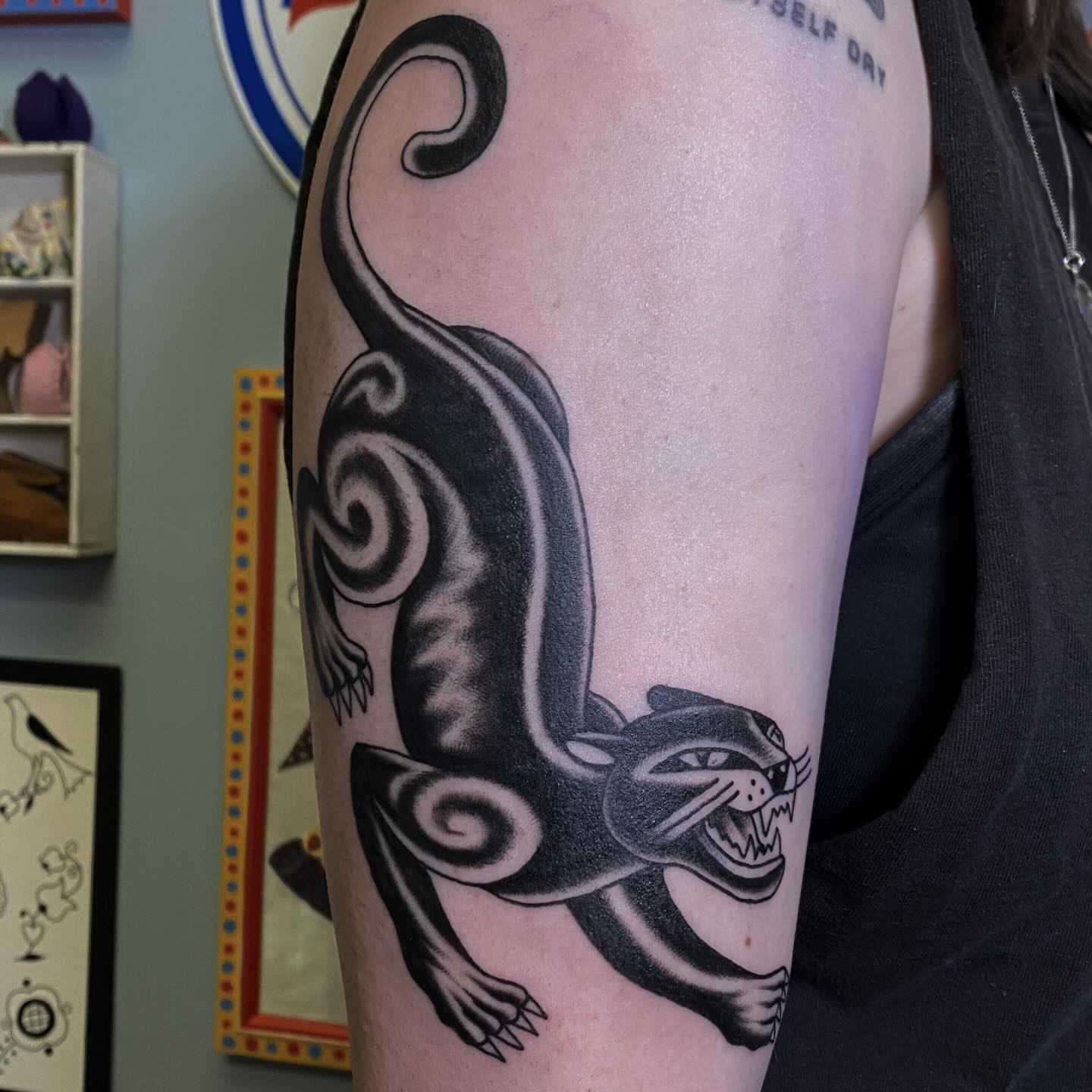 Cat black and grey tattoo on the forearm by Abby Rose Estes
