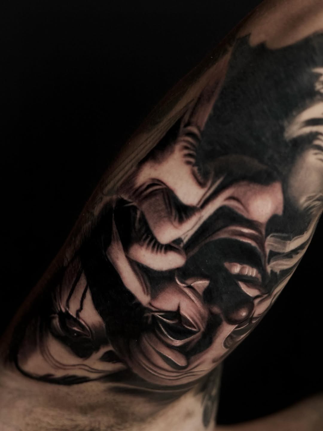 Clown faces realism tattoo on the chest by Bapone