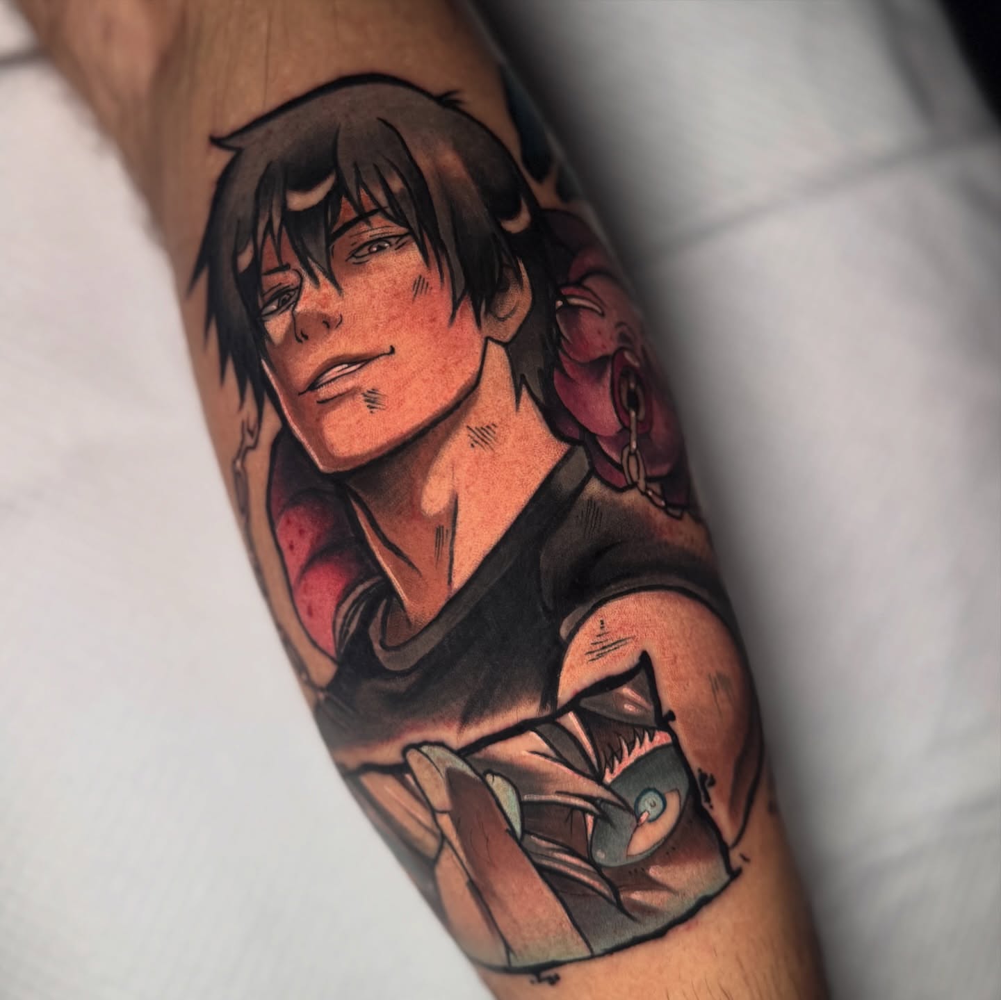 Anime character anime tattoo on the forearm by Caitlyn