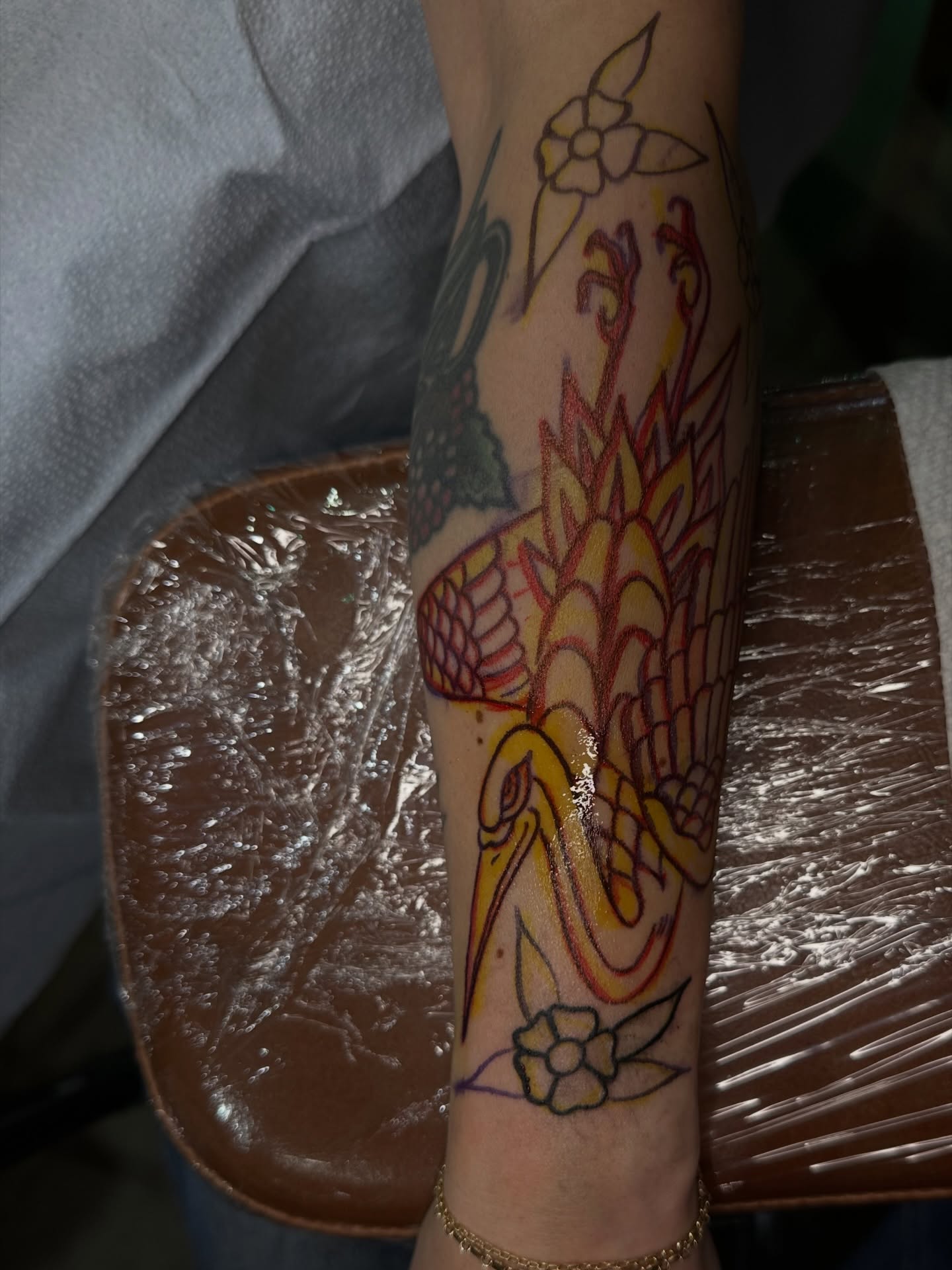 Phoenix American traditional tattoo on the forearm by A.j. Lingerfeldt, Nashville, Tennessee