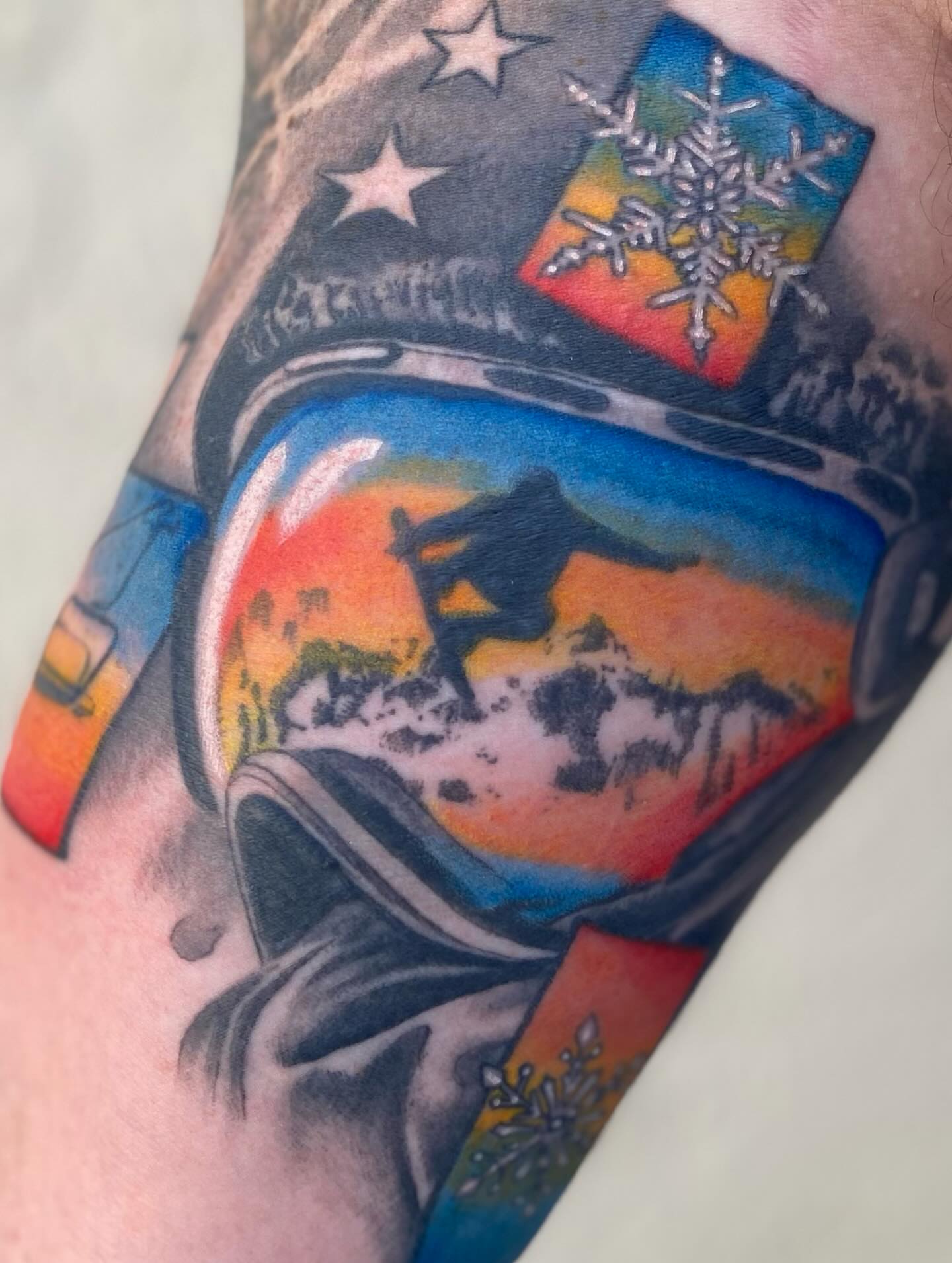 Mountain landscape realism tattoo on the forearm by Hayden Earley