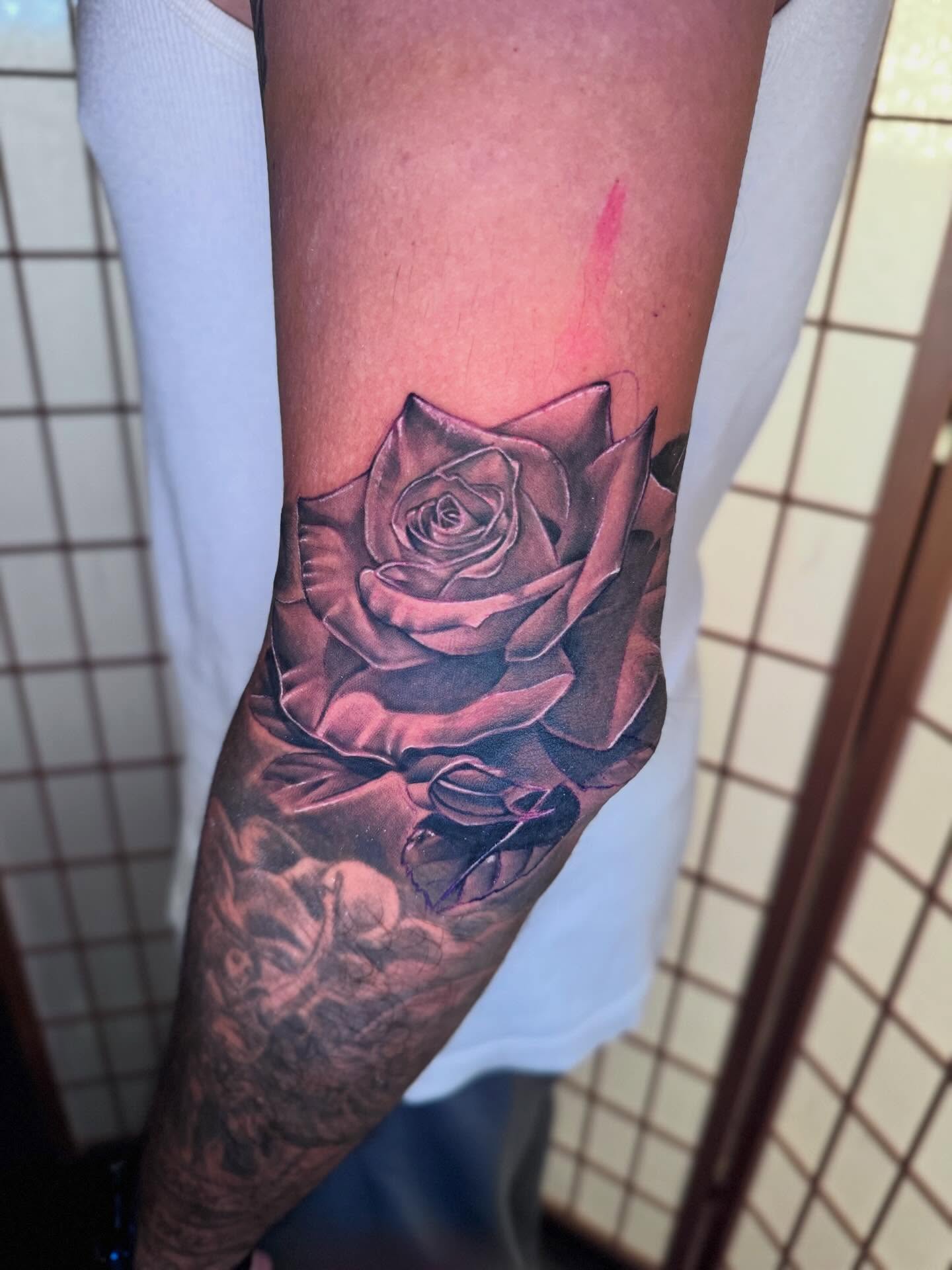 Rose realism tattoo on the forearm by Tattoos By Chico