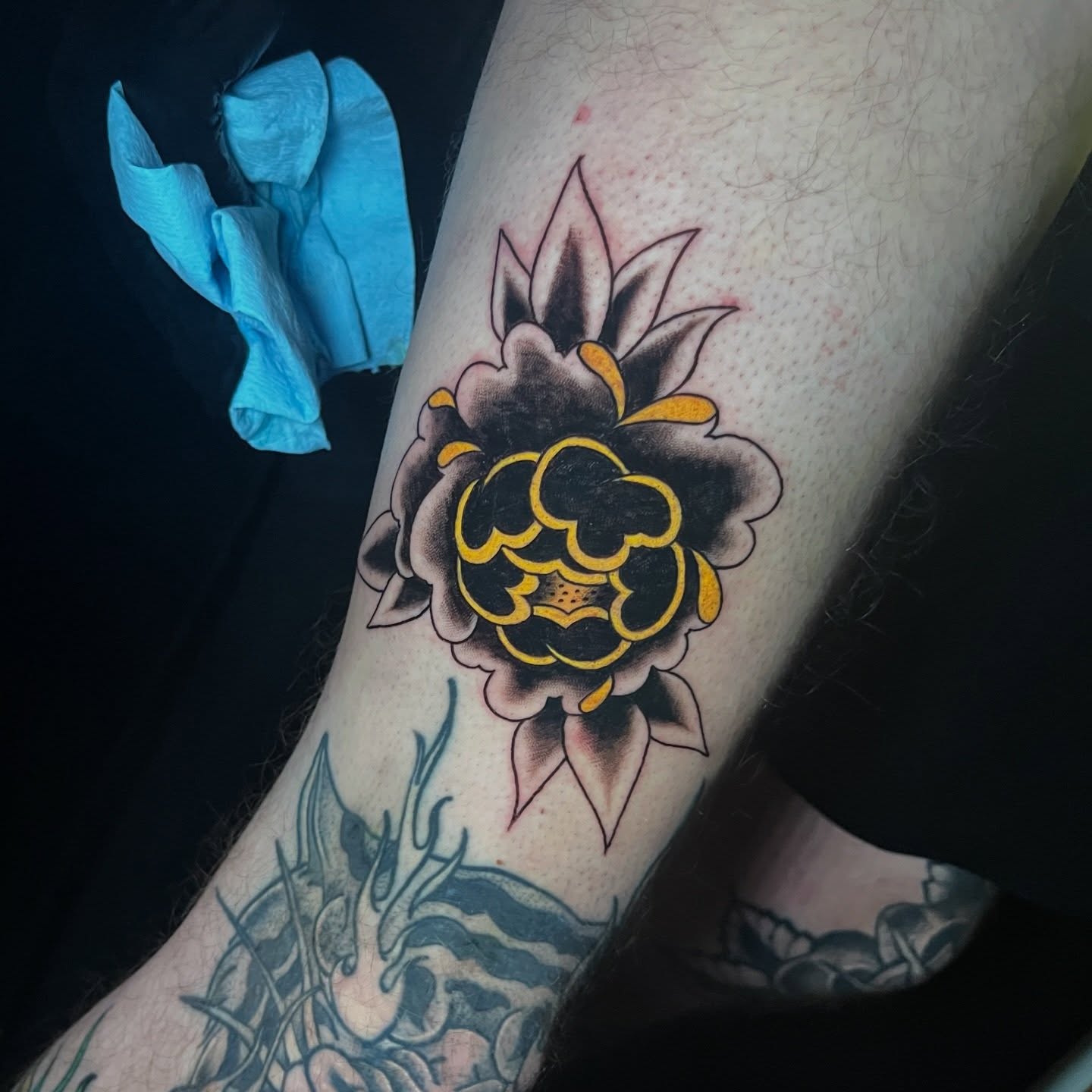 Flower American traditional tattoo on the forearm by Palmer Andrist🩸Fort Collins Tattoo Apprentice