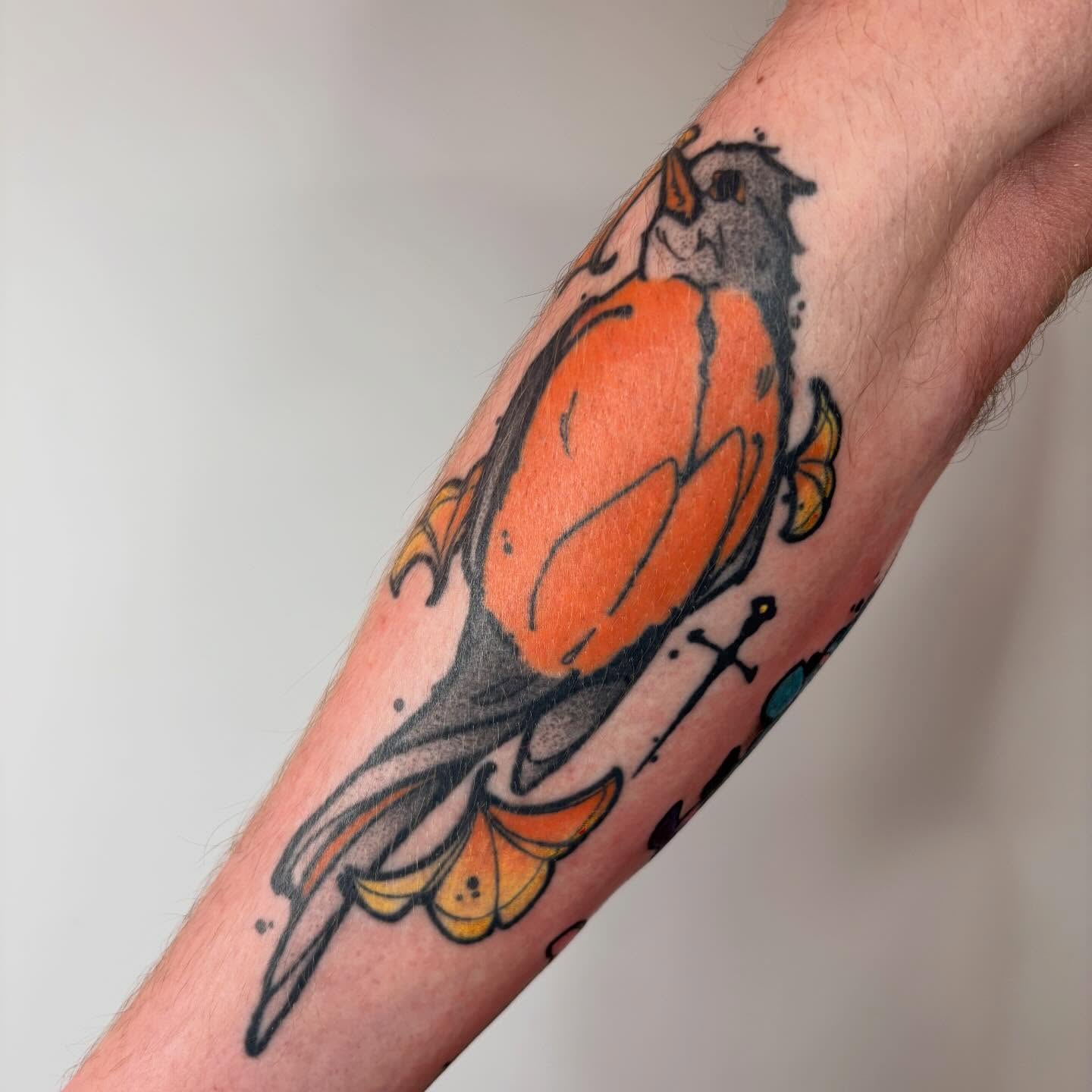 Bird American traditional tattoo on the forearm by Ghost Ham Tattoos