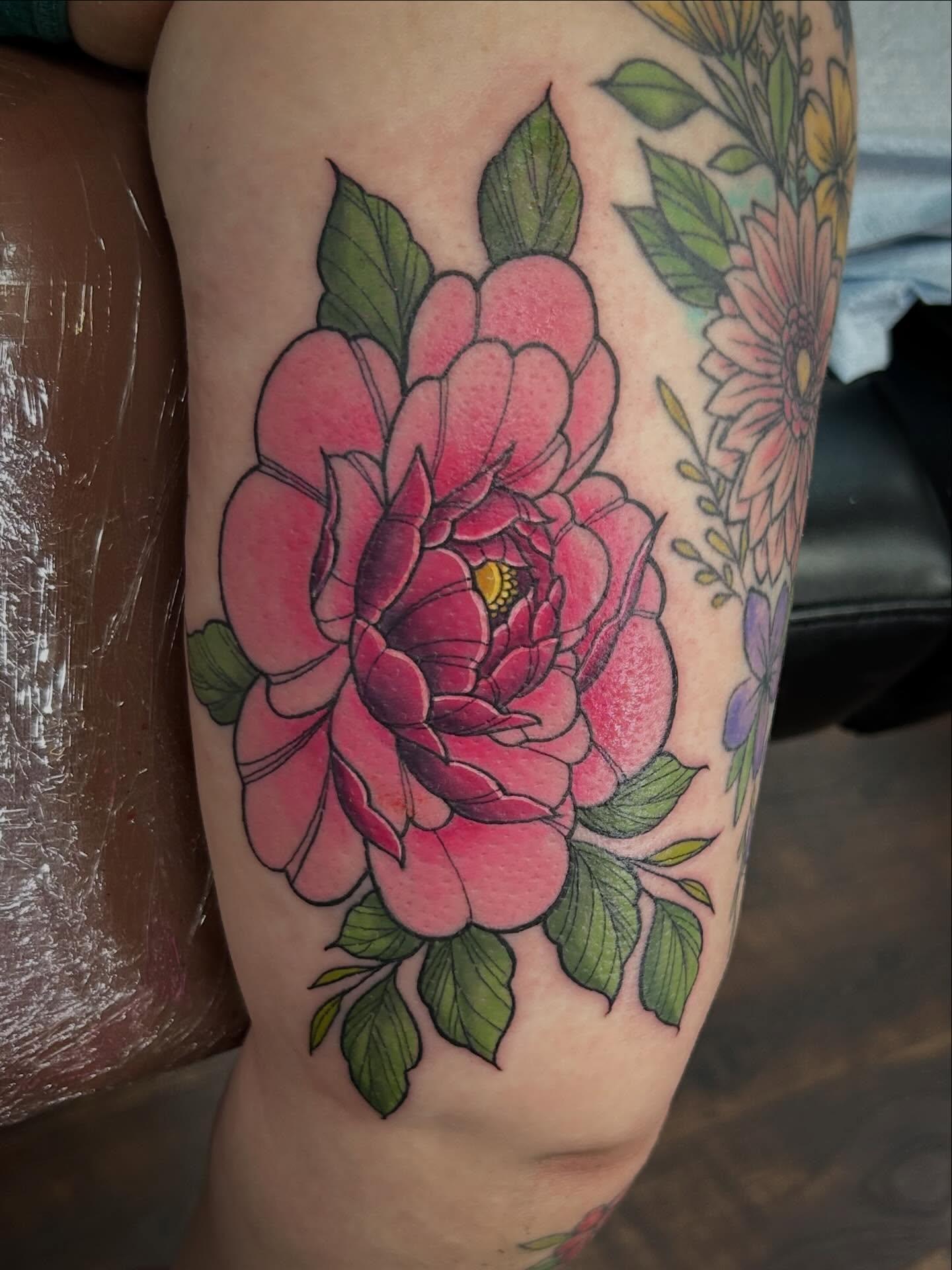 Peony American traditional tattoo on the forearm by Michigan Tattoo Artist - Emily Borneman
