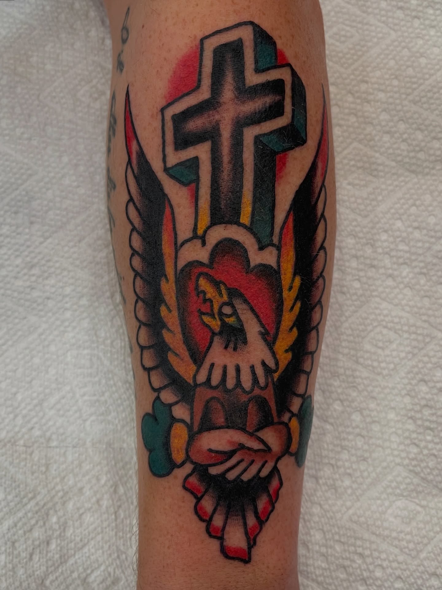 Cross and eagle American traditional tattoo on the forearm by Alex Garcia - Sac City Tattoo