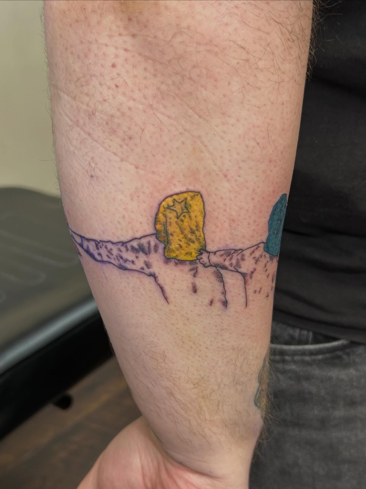 Desert landscape dotwork tattoo on the forearm by Michigan Tattoo Artist - Emily Borneman