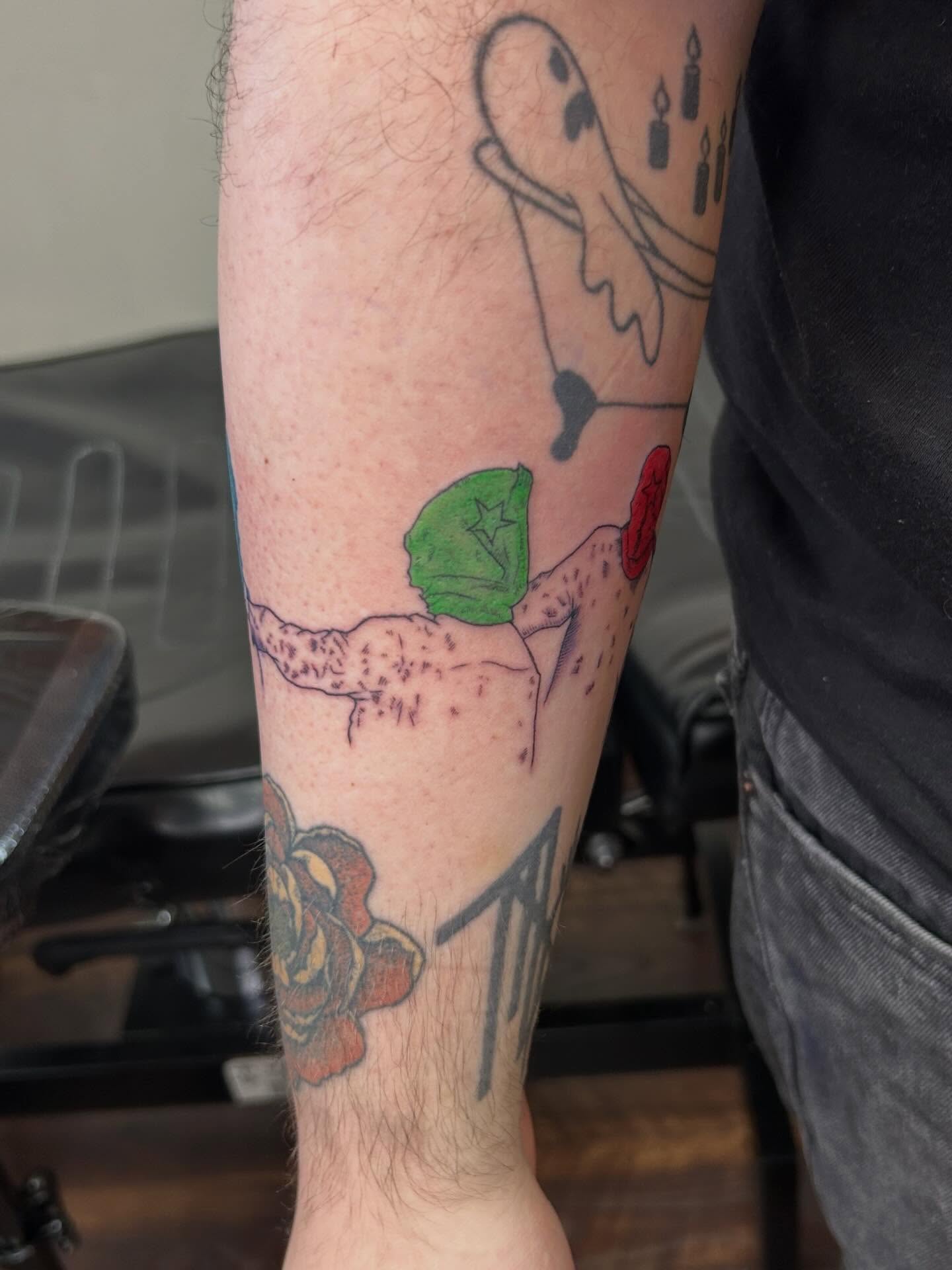 Ghost, rose, leaf American traditional tattoo on the forearm by Michigan Tattoo Artist - Emily Borneman