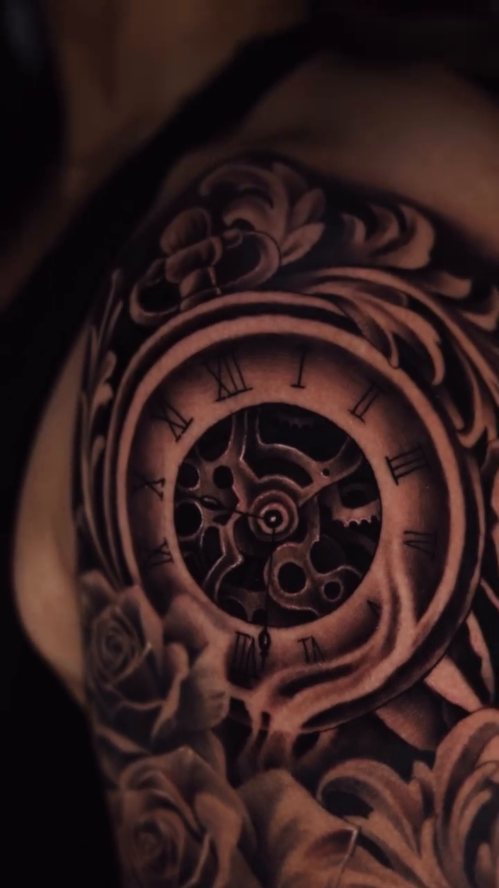 Clockwork heart and roses realism tattoo by Anthony Maya
