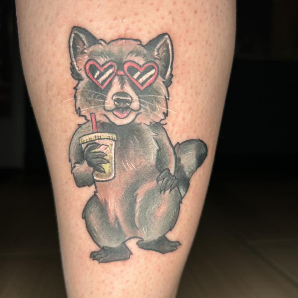 Raccoon realism tattoo on the thigh by Nino