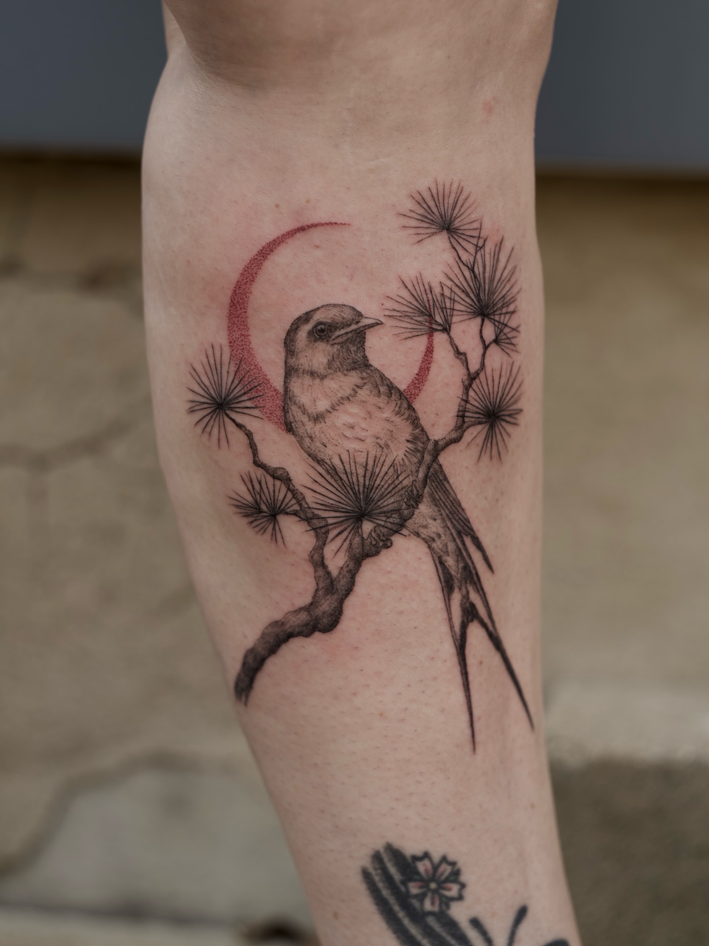 Bird perched on branch black and grey tattoo on the forearm by Kevin Rotramel, Dayton, Ohio