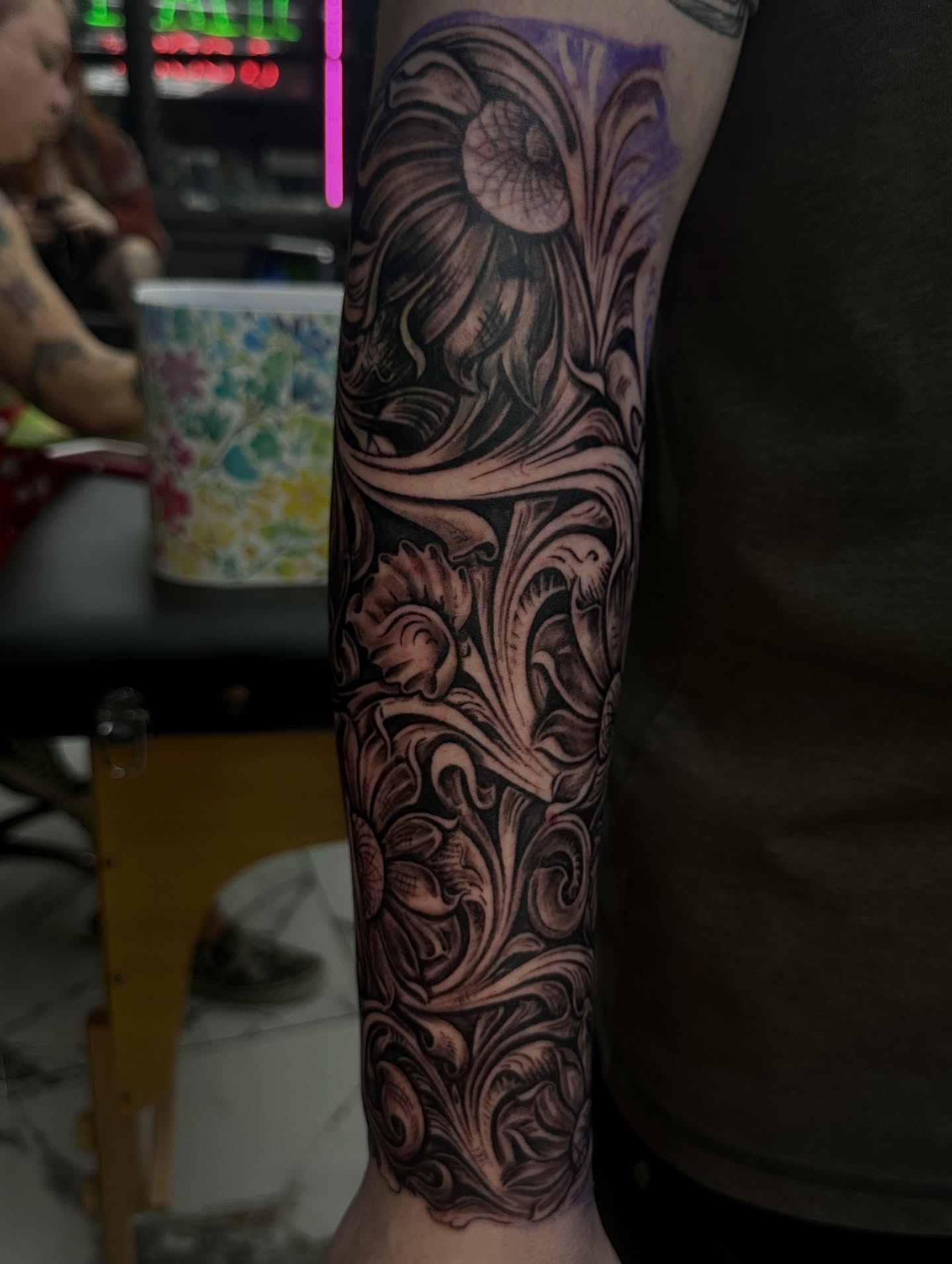 Floral design ornamental tattoo on the forearm by Billy Harris