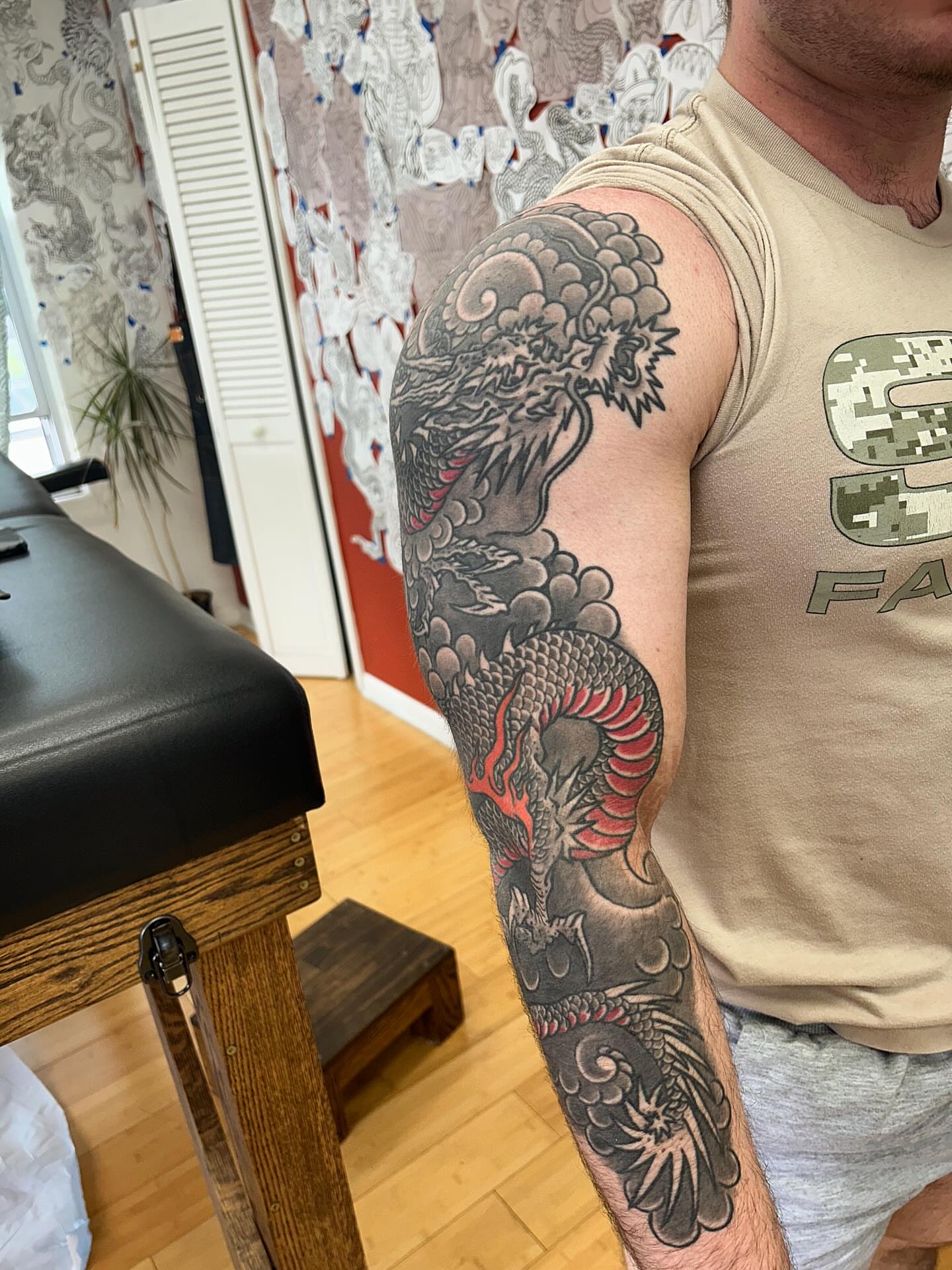 Dragon japanese irezumi tattoo on the upper arm by Matthew Crimson