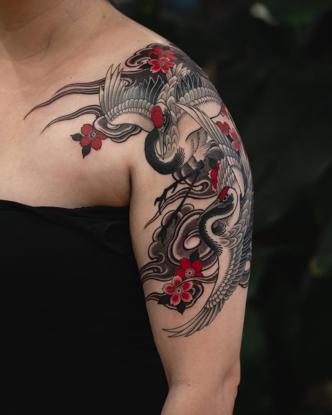 Cranes and flowers Japanese tattoo on the shoulder by Matt Leibo, San Francisco, California