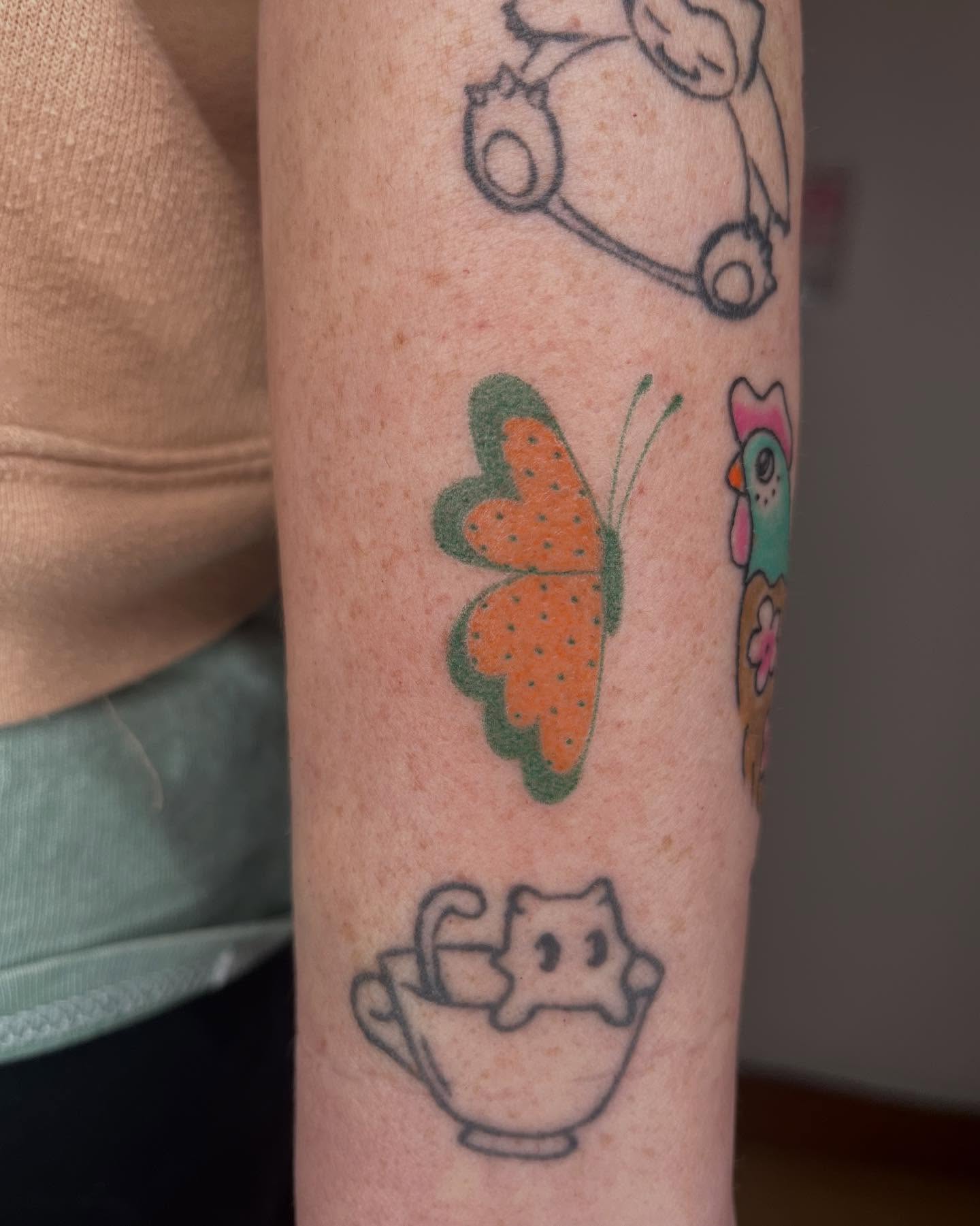 Butterfly dotwork tattoo on the forearm by Jenna