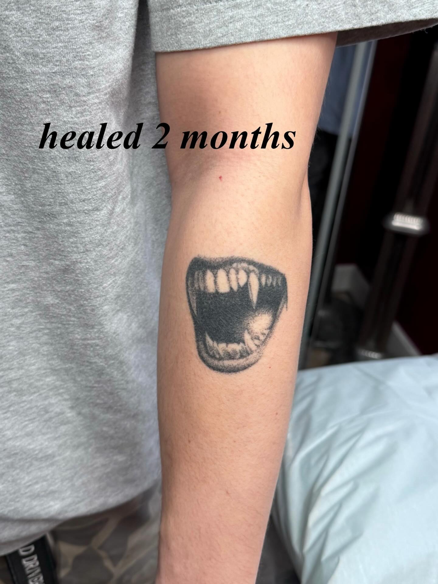 Open mouth black and grey tattoo on the forearm by πΏππΌππ πππππππ