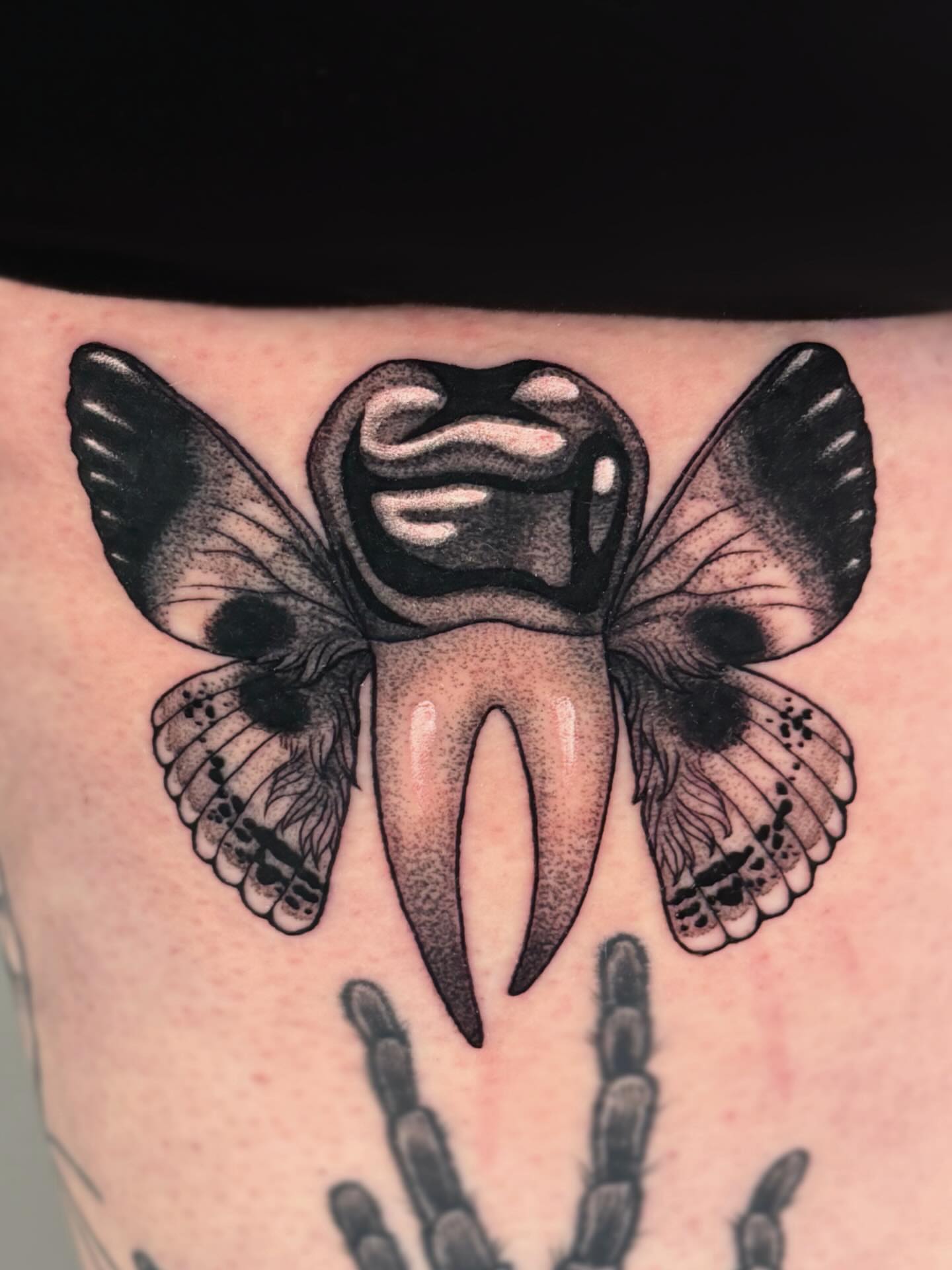 Moth tooth dotwork tattoo on the thigh by leanna patterson, Ruston, Louisiana