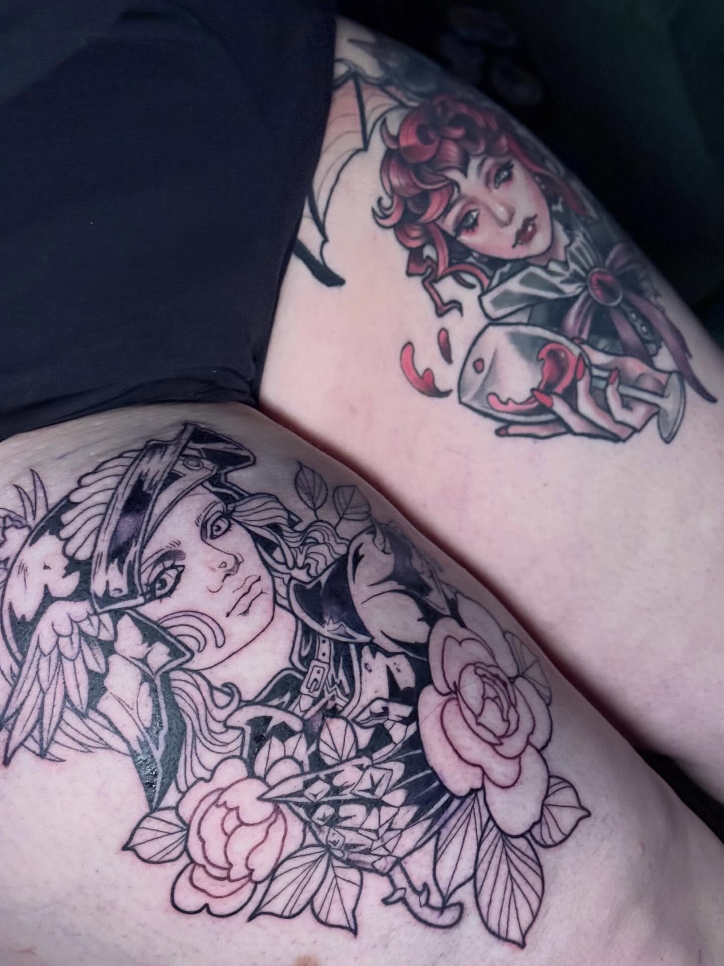 Female warrior with roses American traditional tattoo on the thigh by Ash Sansoucie