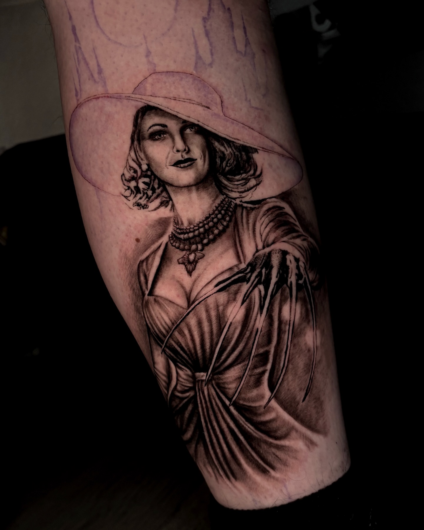 Woman wearing hat realism tattoo on the forearm by Trev