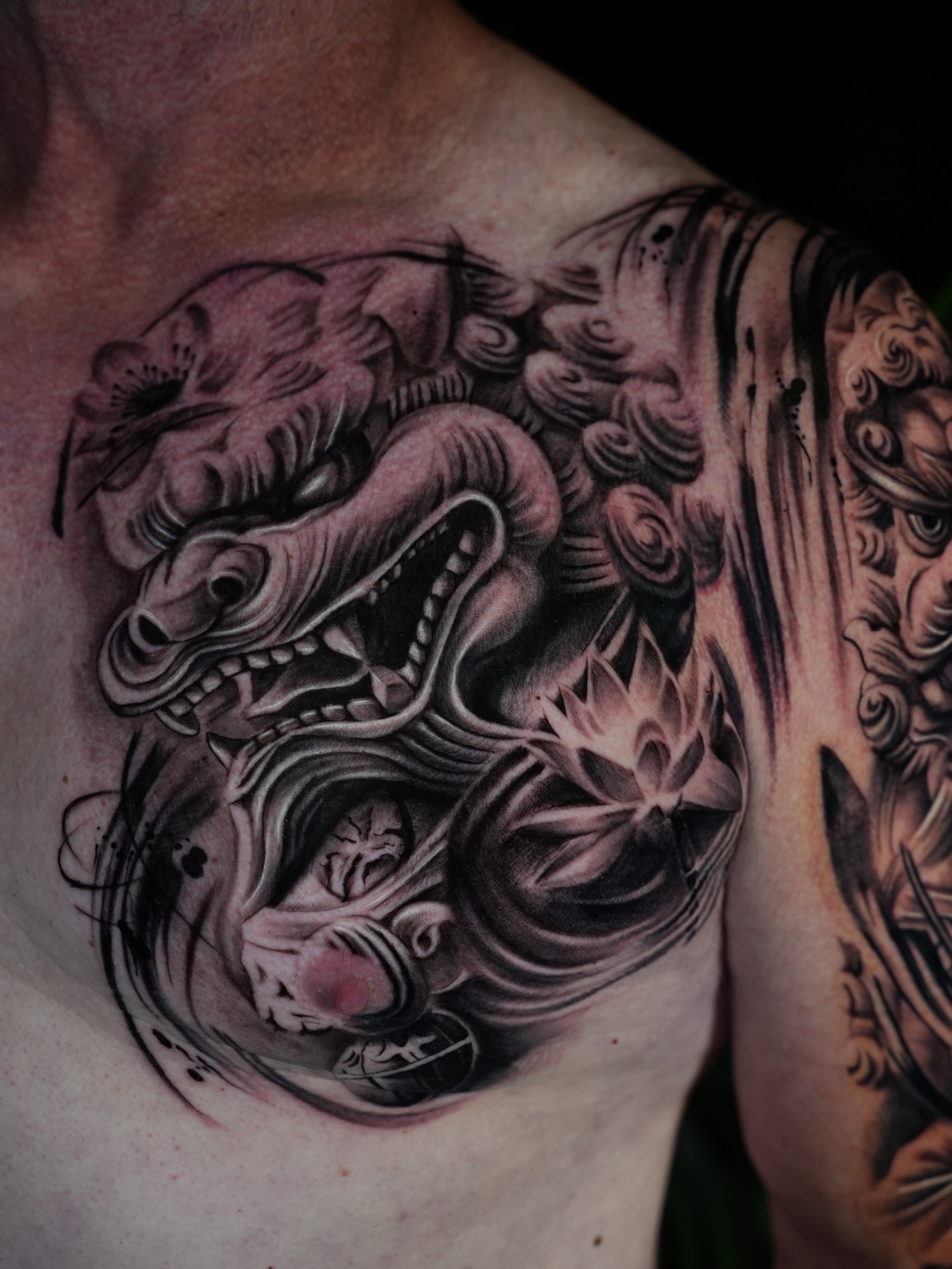 Dragon and lotus japanese irezumi tattoo on the chest by BillydaKid