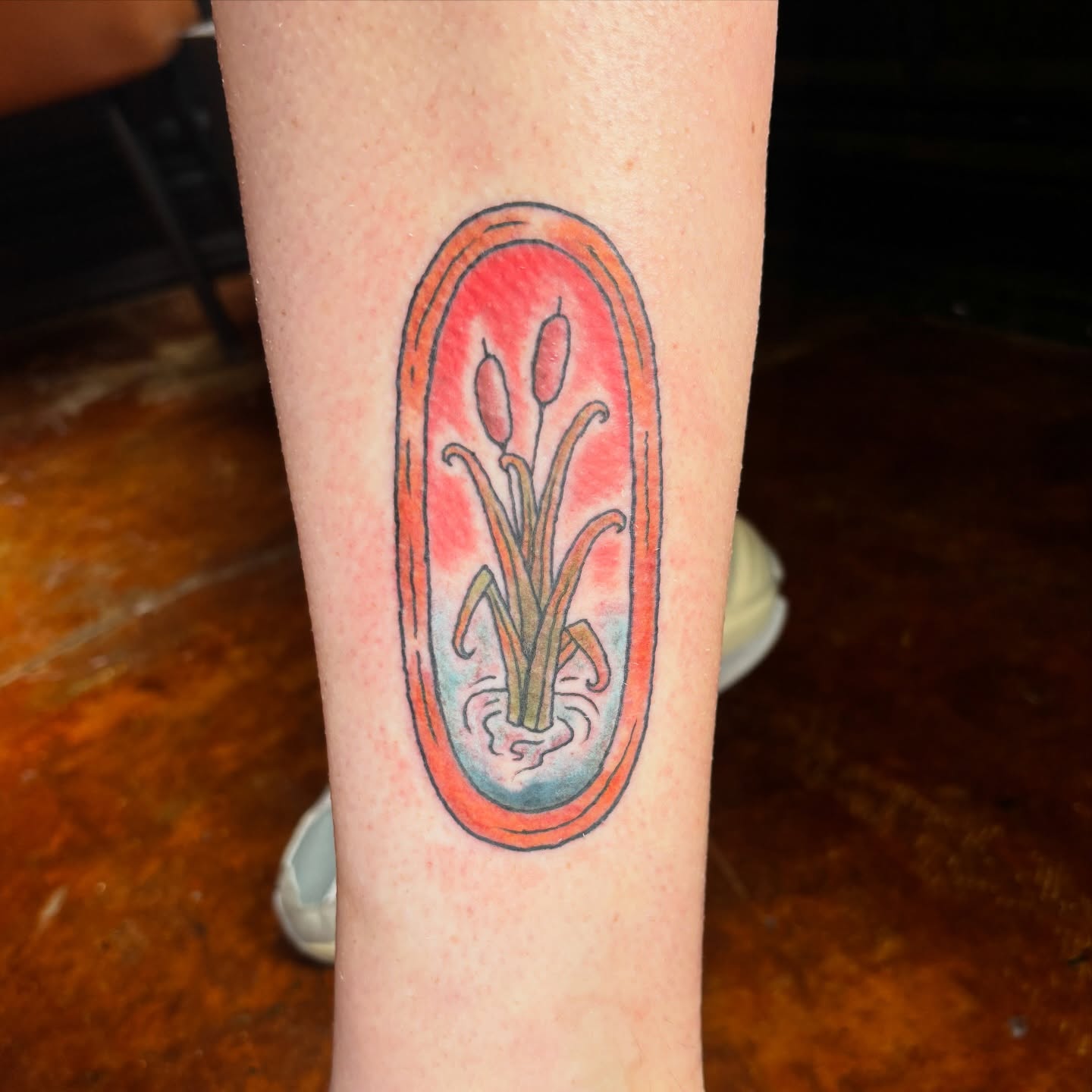 Tulips American traditional tattoo on the forearm by Lilly Evans