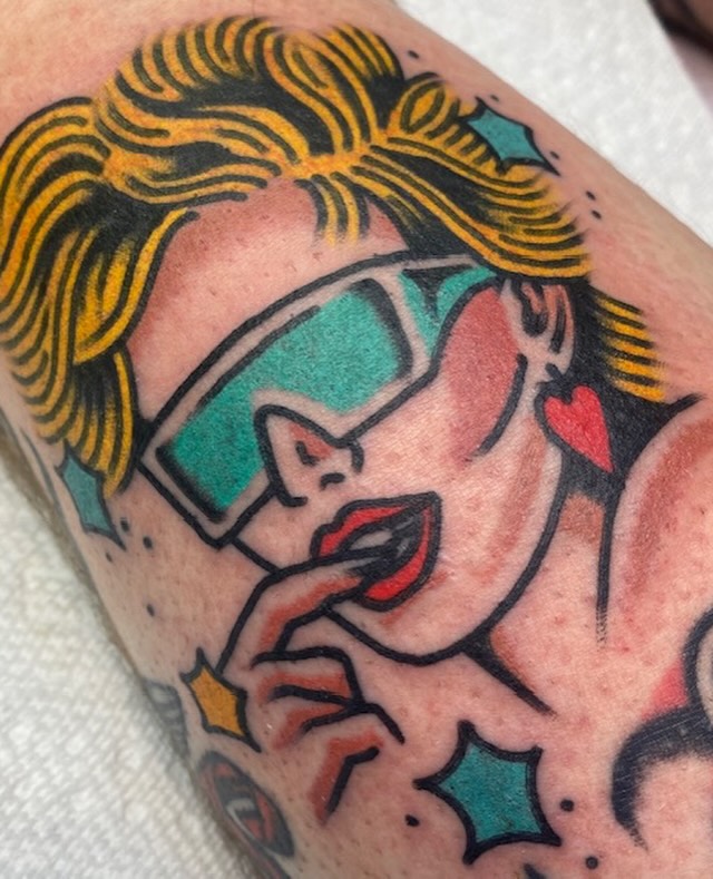 Woman with sunglasses American traditional tattoo on the forearm by ⛓️ L̷i̷n̷n̷e̷a̷⛓️, Las Vegas, Nevada