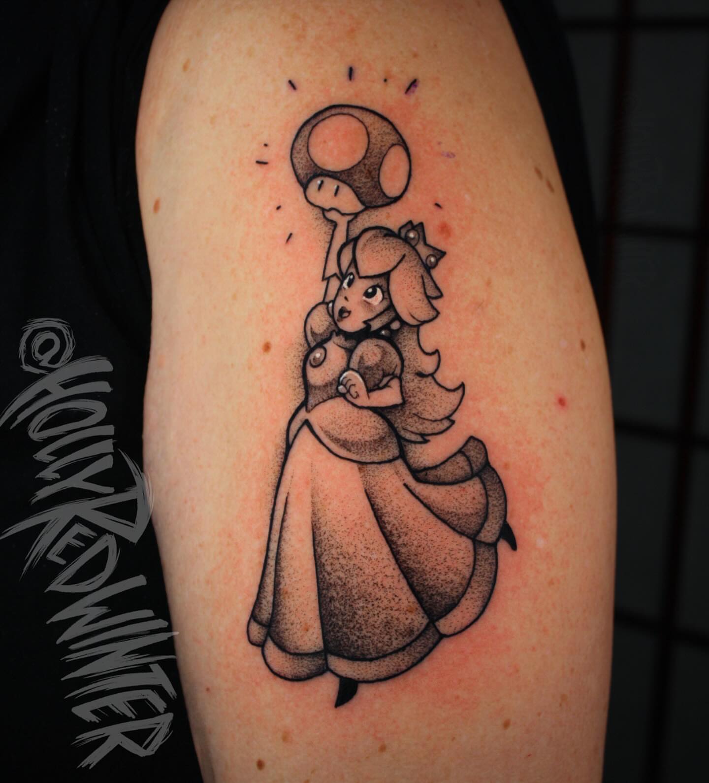 Rosalina and mushroom dotwork tattoo on the upper arm by Holly Redwinter