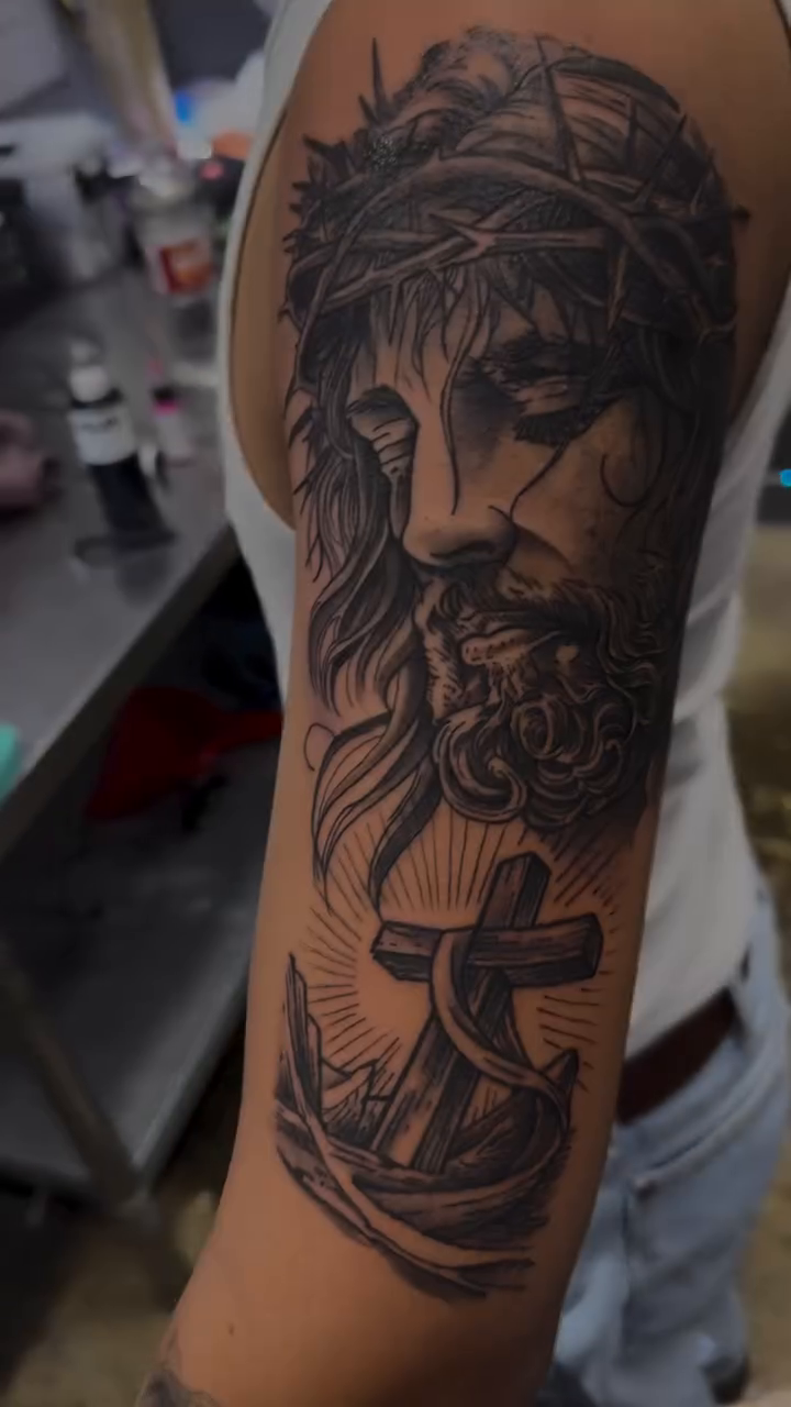 Jesus Christ with anchor realism tattoo by Houston Tattoo Artist