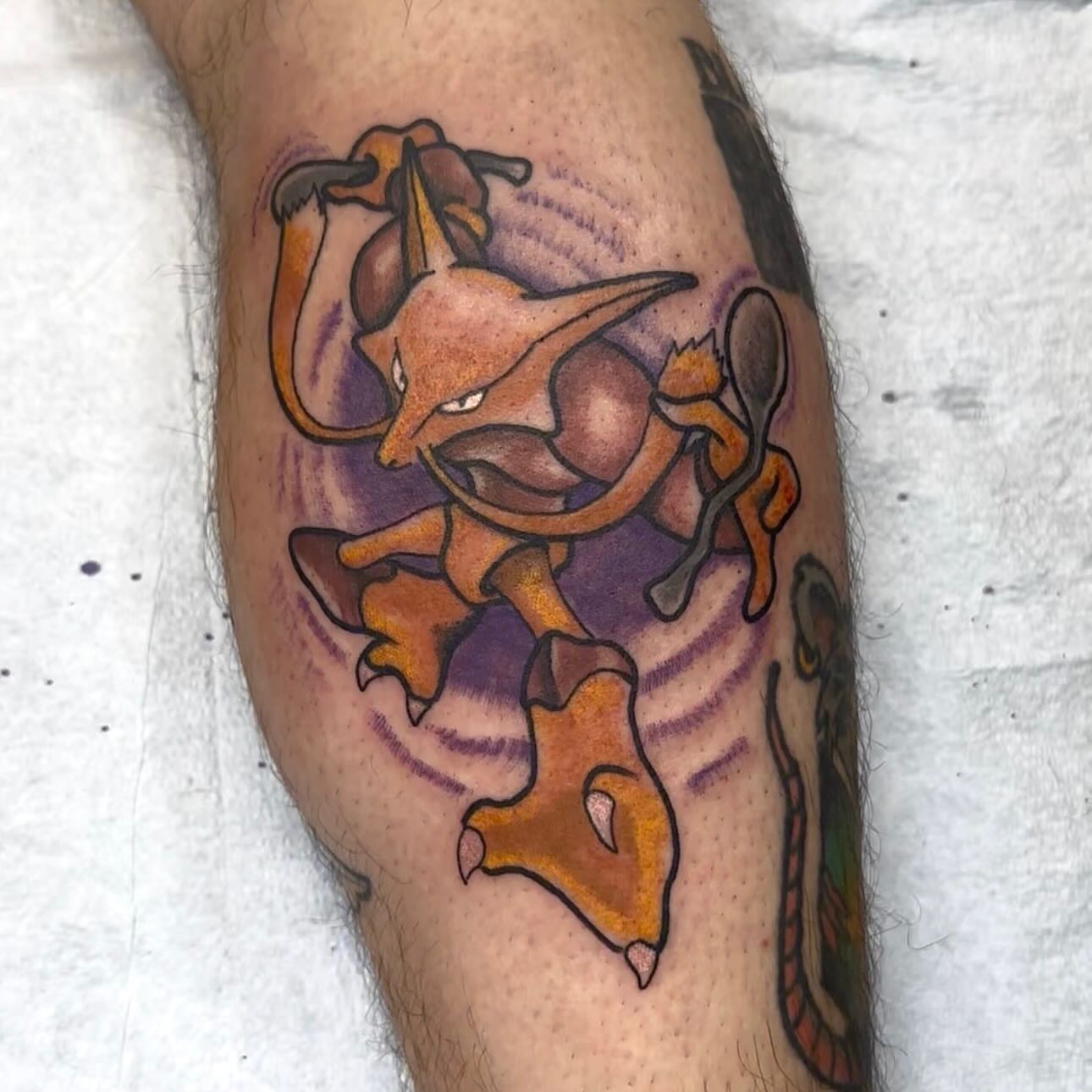 Charizard new school tattoo on the forearm by Olive Kelley