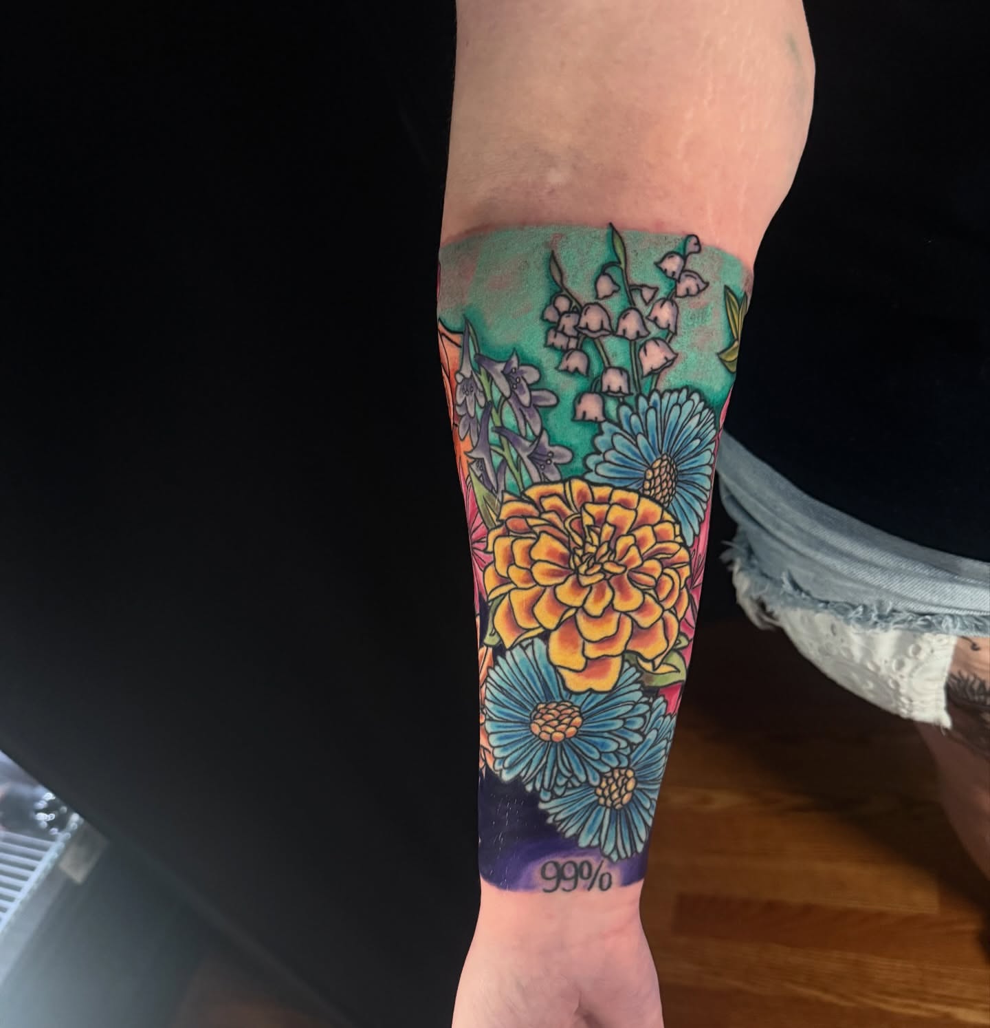 Floral bouquet new school tattoo on the forearm by joshua sides