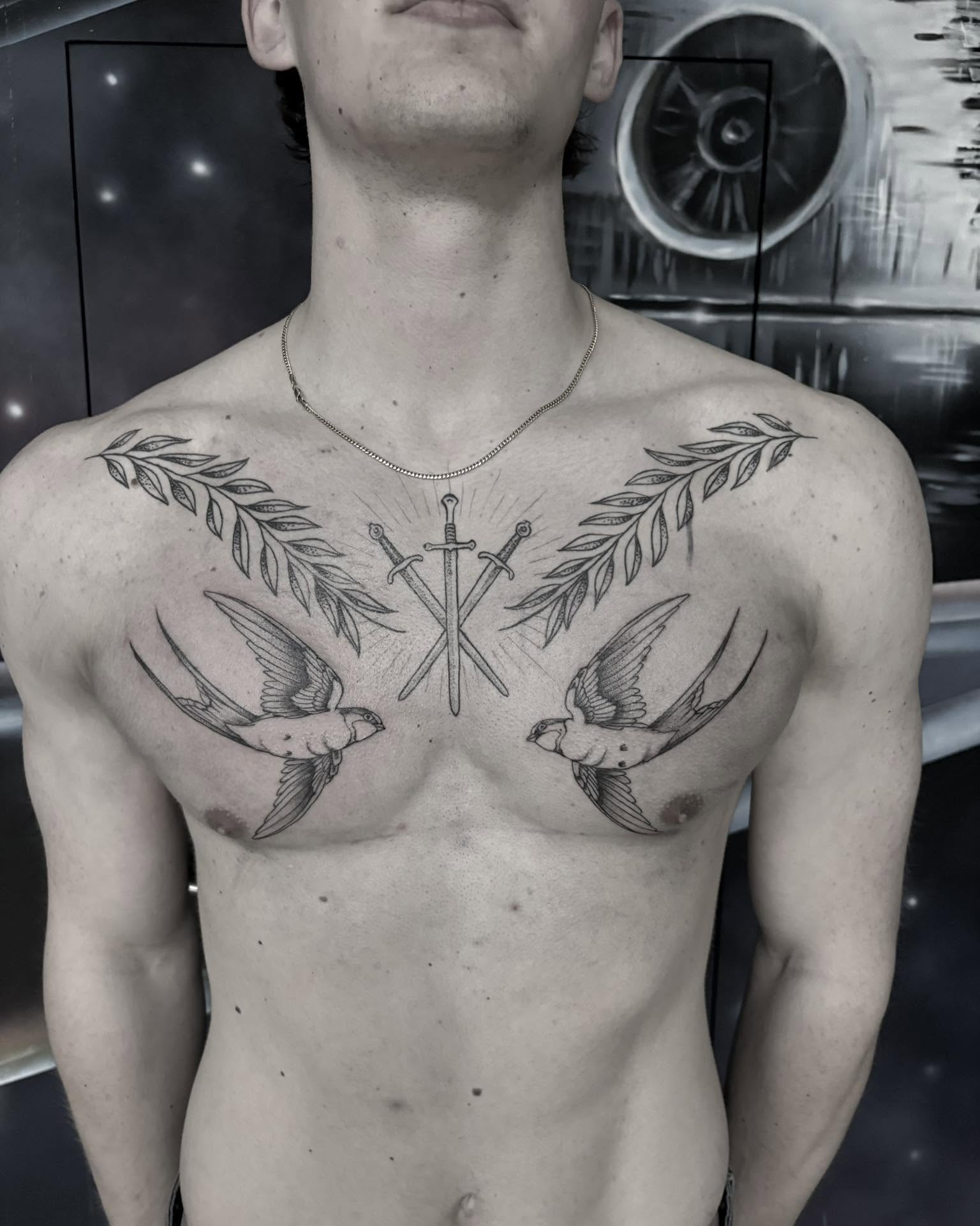 Swallows and swords black and grey tattoo on the chest by Léon Huiting