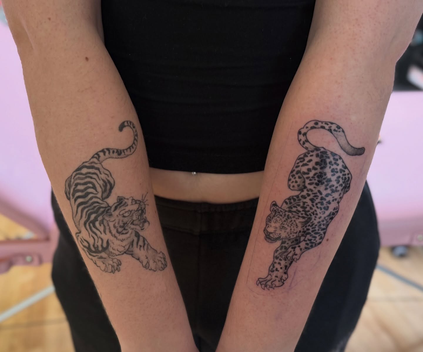 Tiger and leopard black and grey tattoo on the forearm by Kelsey Lynn▪️Raleigh Tattoo Artist
