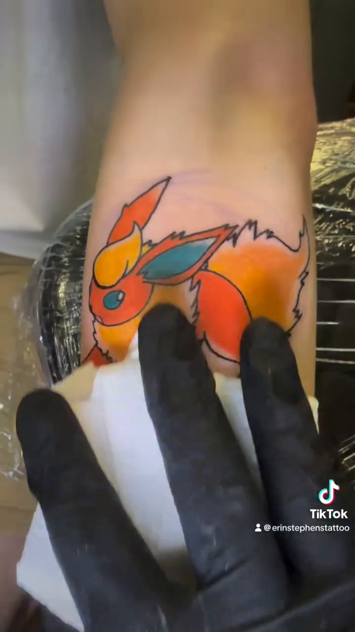 Pokemon Flareon tattoo new school tattoo on the upper arm by π Erin Stephens π€