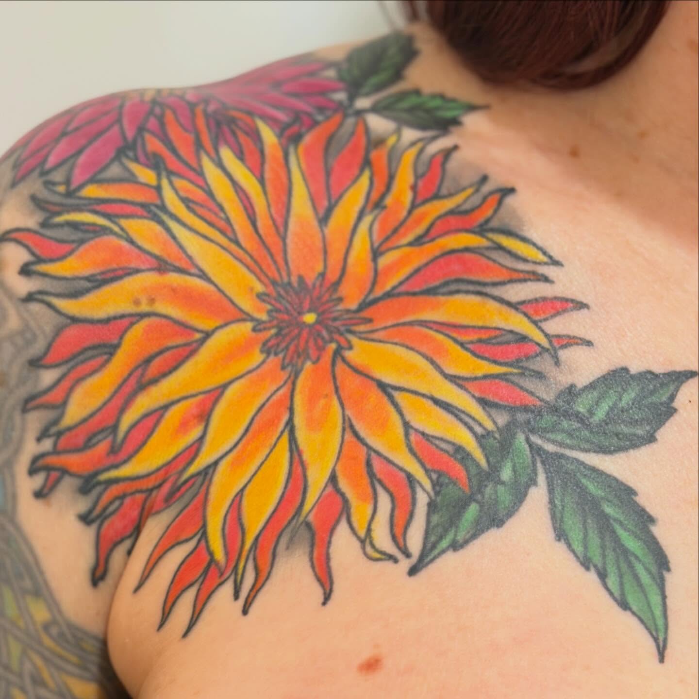 Sunflower new school tattoo on the shoulder by Laura Saadati Kepper